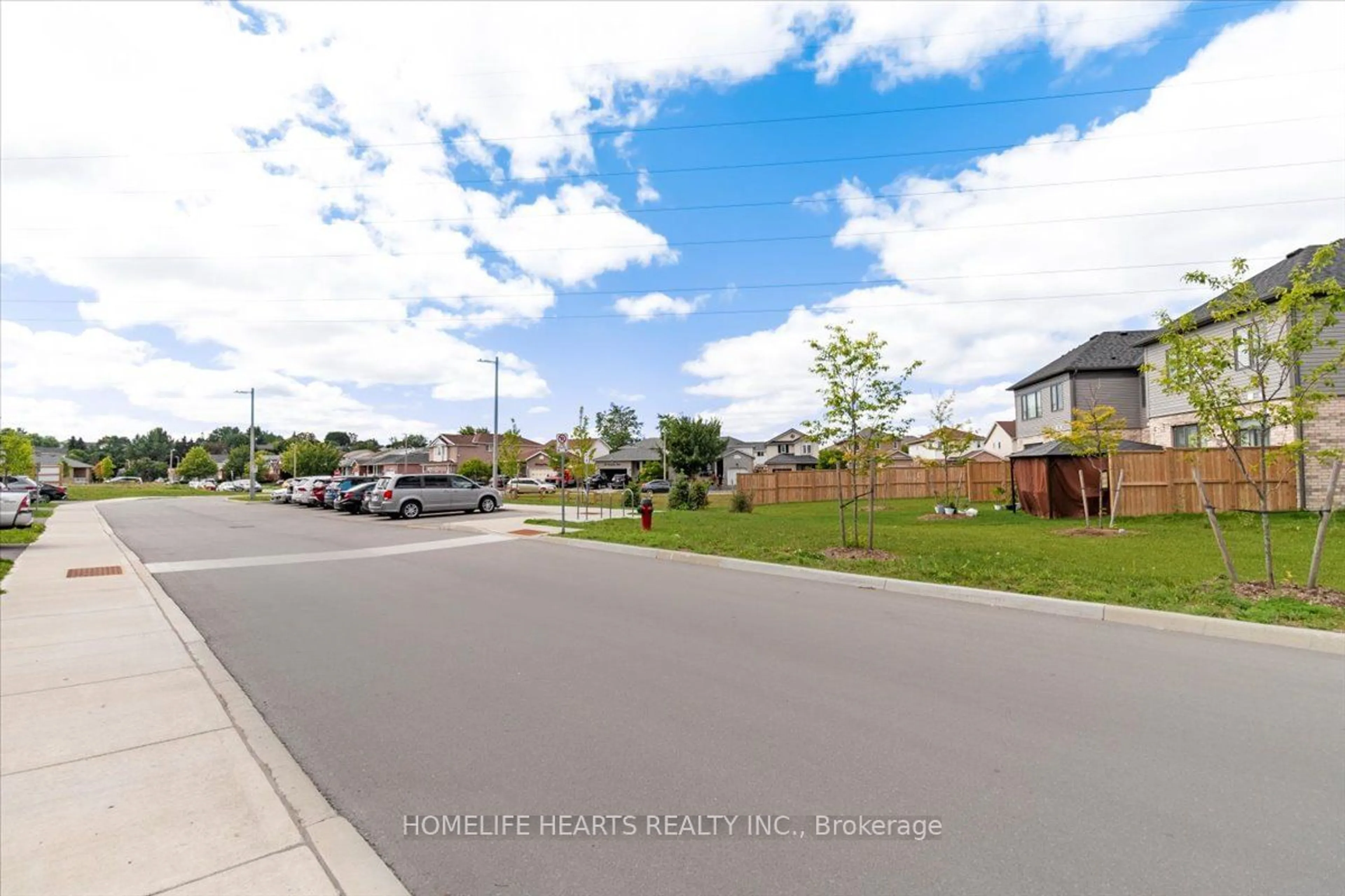 A pic from outside/outdoor area/front of a property/back of a property/a pic from drone, street for 166 Deerpath Dr #55, Guelph Ontario N1K 0E2