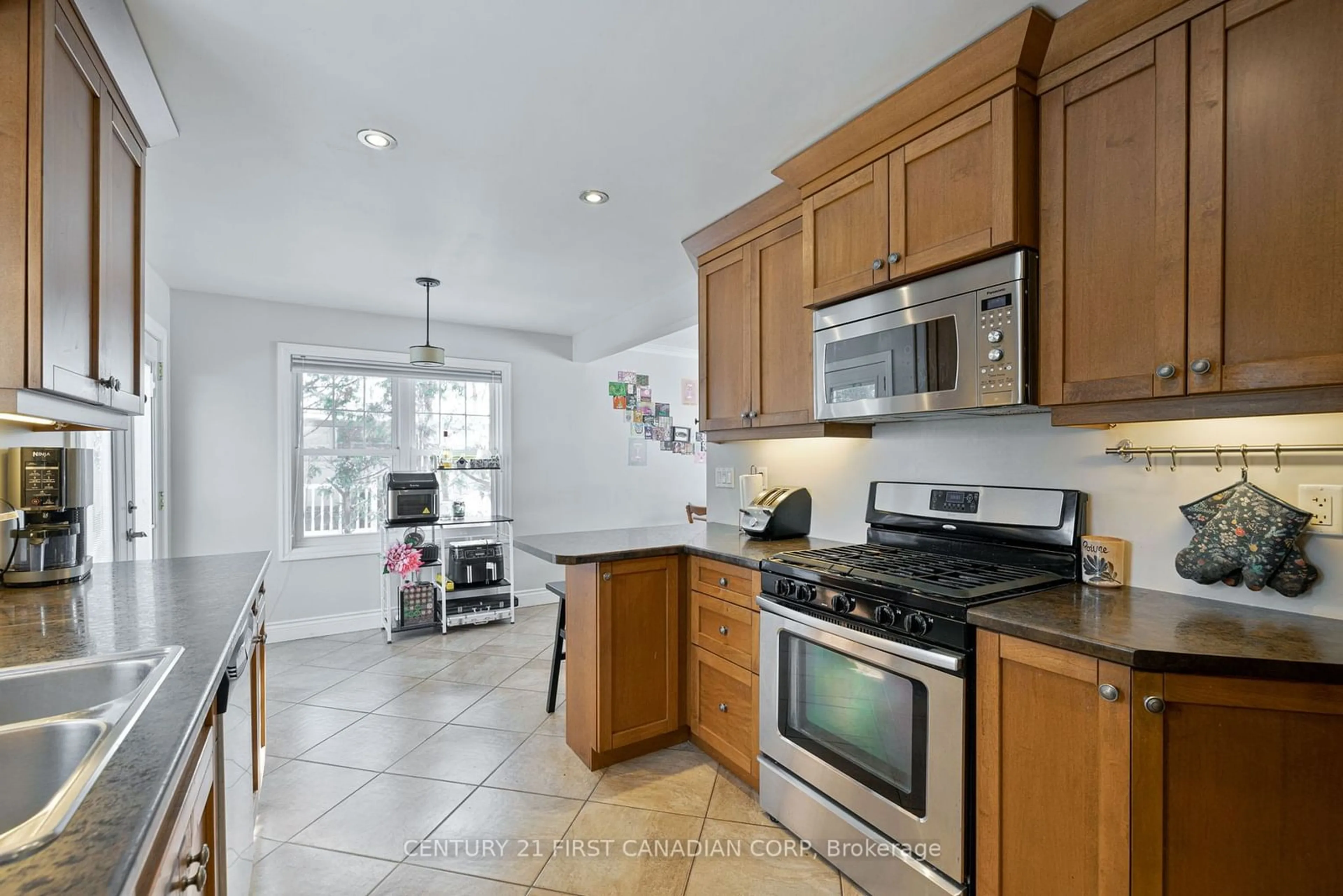 Open concept kitchen, ceramic/tile floor for 74 Barker St, London Ontario N5Y 1X7