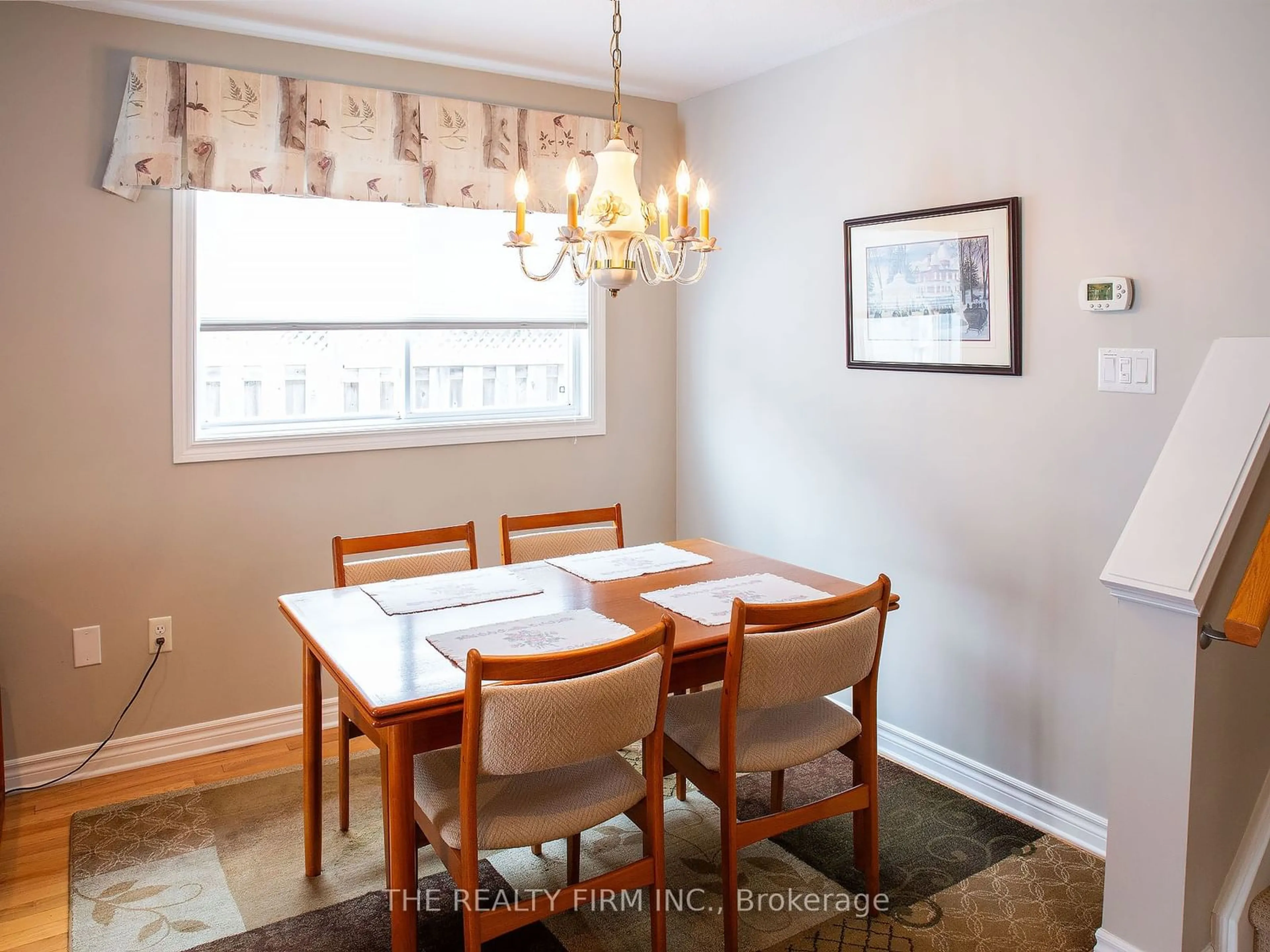 Dining room, wood/laminate floor for 1601 Evans Blvd, London Ontario N6M 0A9