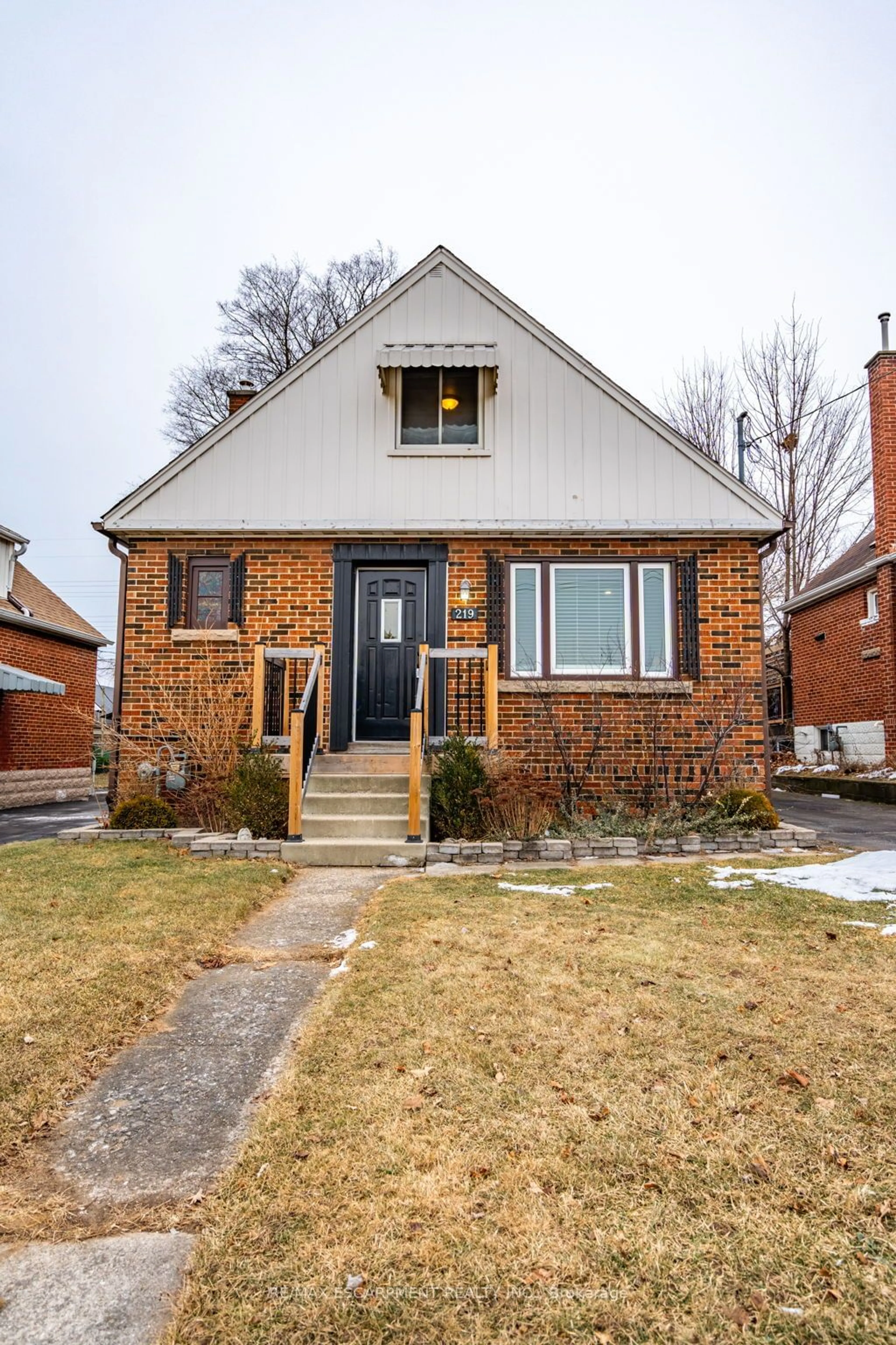 Home with brick exterior material, street for 219 RODGERS Rd, Hamilton Ontario L8K 3C3