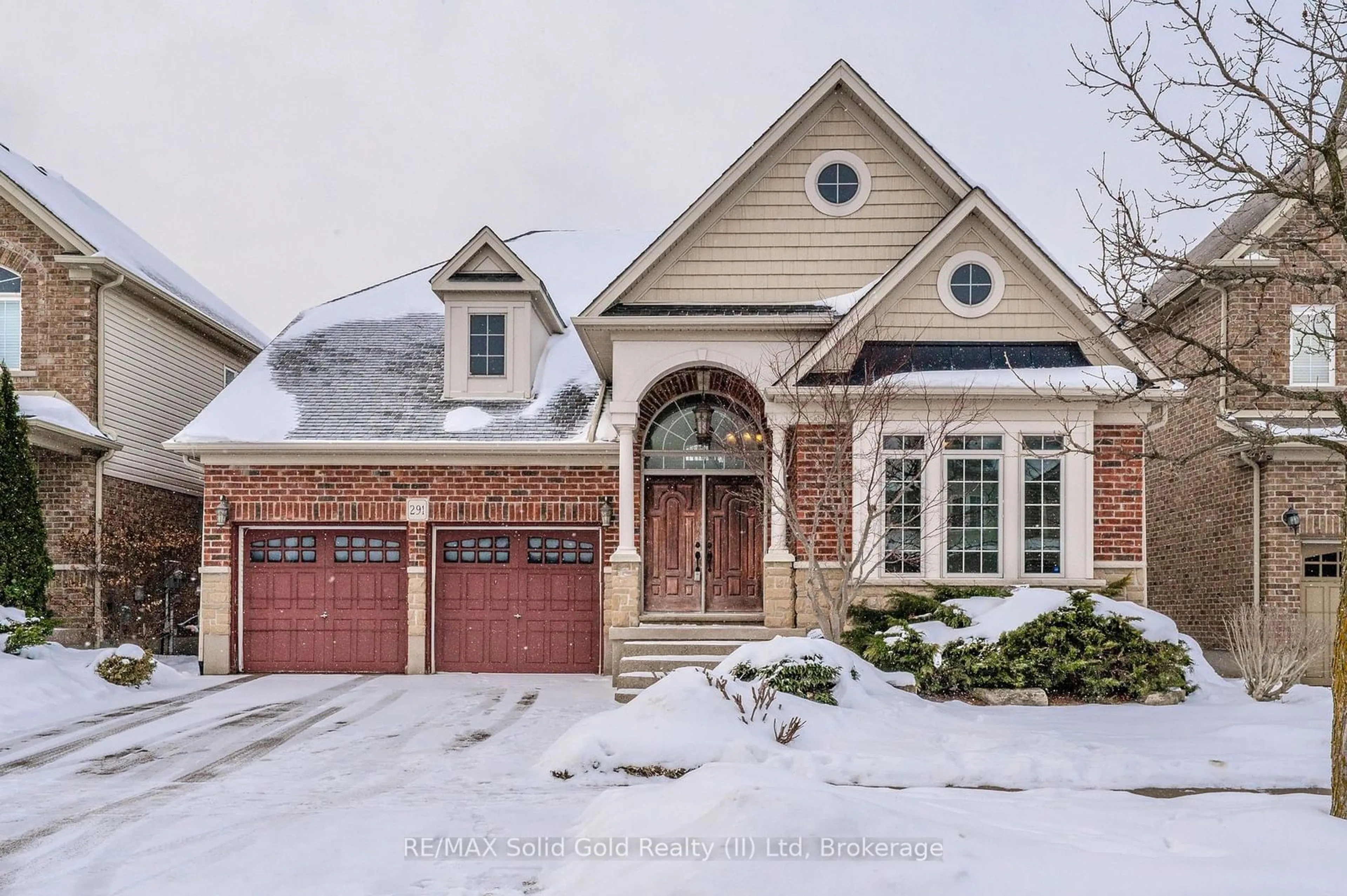 Home with brick exterior material, street for 291 Sims Estate Dr, Kitchener Ontario N2A 4L4