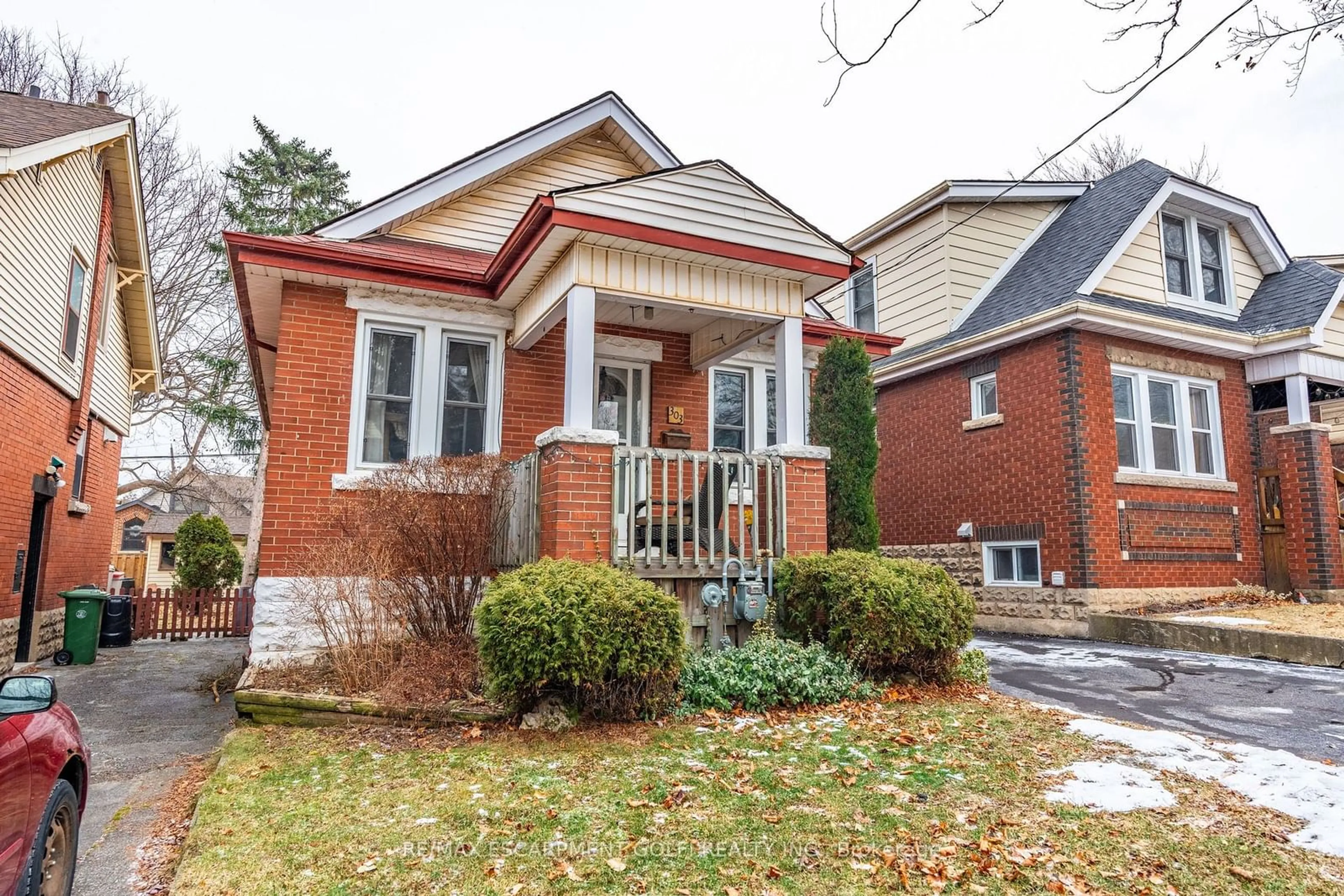 Home with brick exterior material, street for 303 HOUGHTON Ave, Hamilton Ontario L8K 2N4