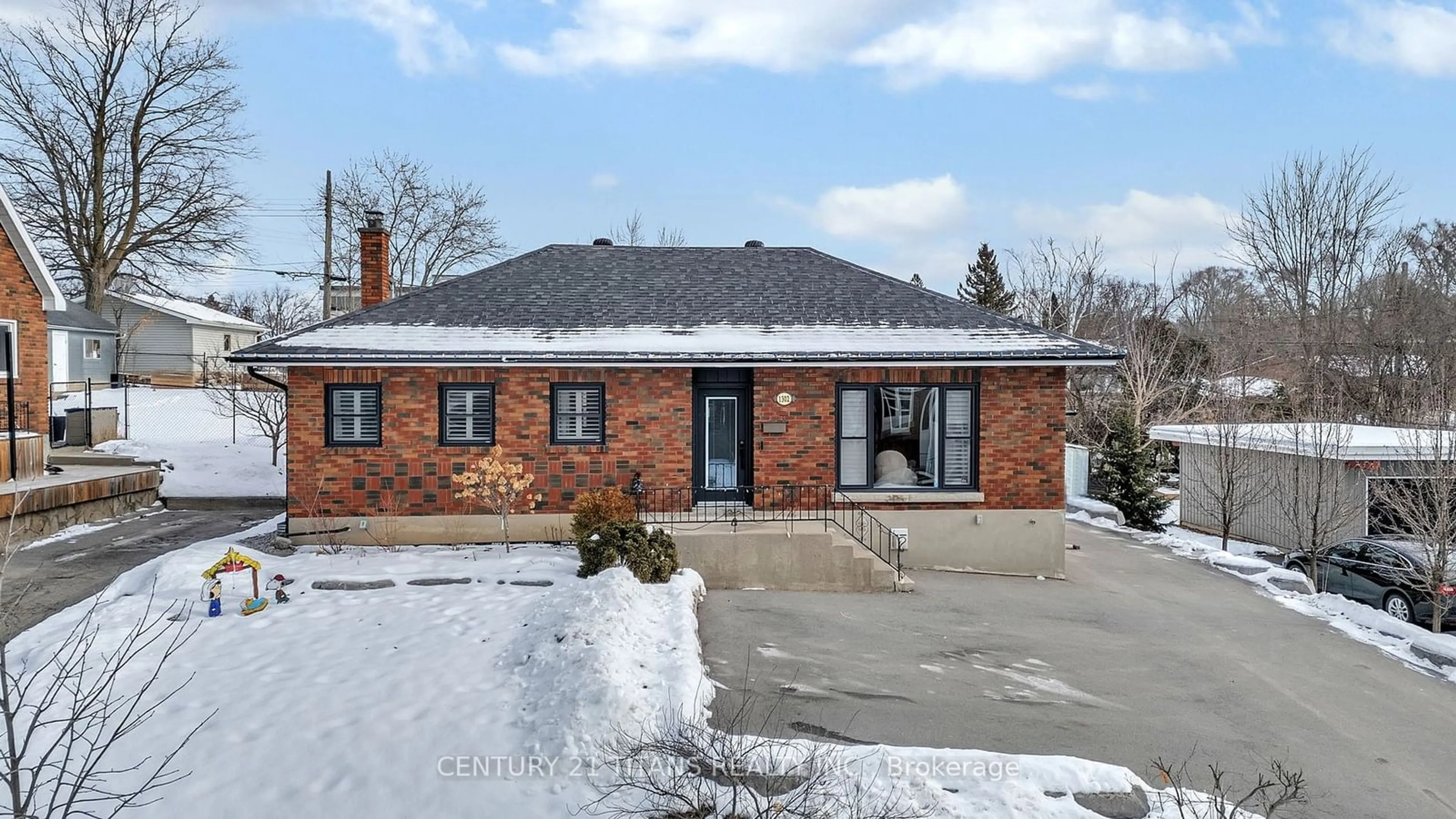 Home with brick exterior material, street for 1302 Dobbin Ave, Peterborough Ontario K9J 6A8