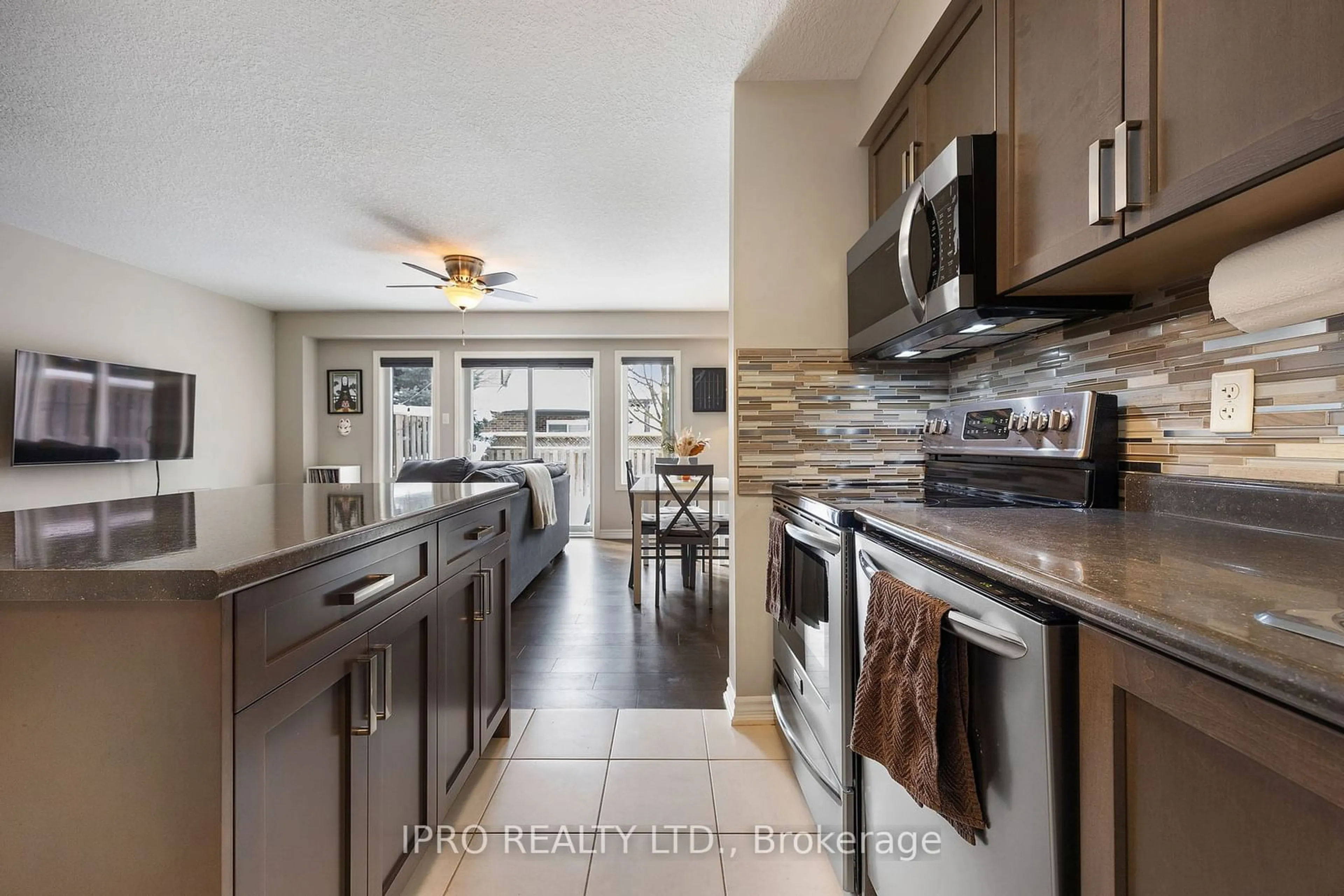 Open concept kitchen, ceramic/tile floor for 56 Tanton Ave, Centre Wellington Ontario N1M 0C3