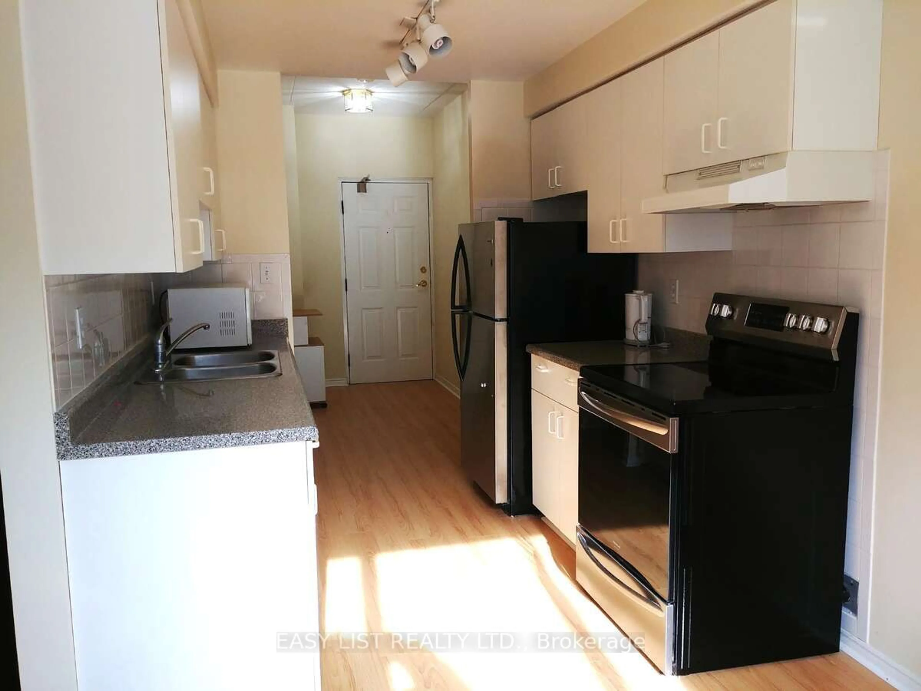 Standard kitchen, wood/laminate floor for 1885 Normandy St #104, LaSalle Ontario N9H 1P9