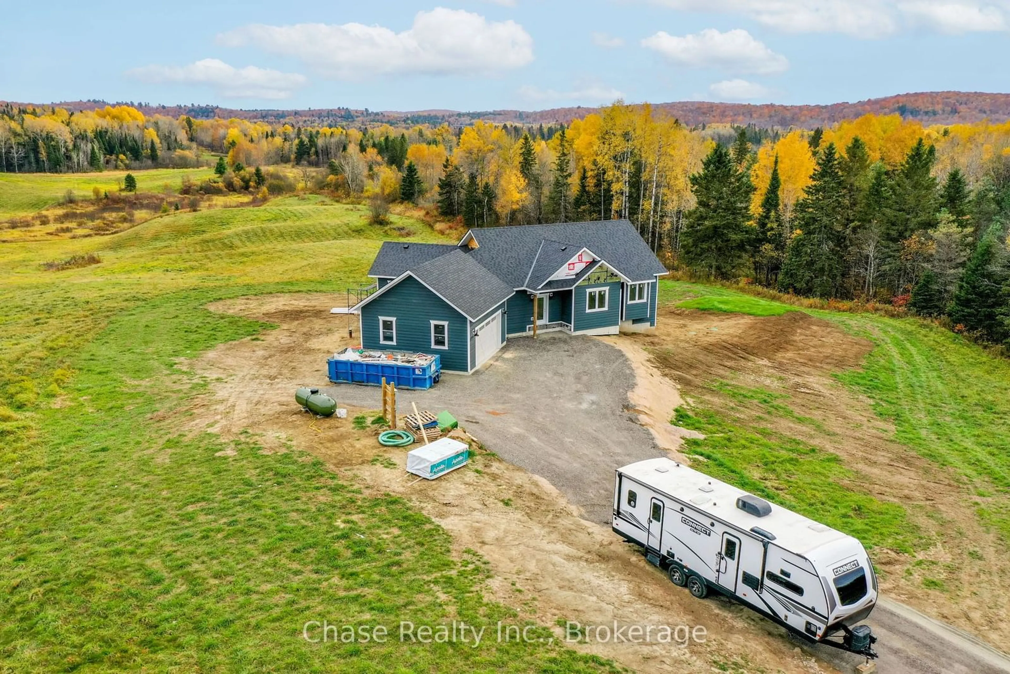 A pic from outside/outdoor area/front of a property/back of a property/a pic from drone, mountain view for 141 Three Mile Lake Rd, Armour Ontario P0A 1L0