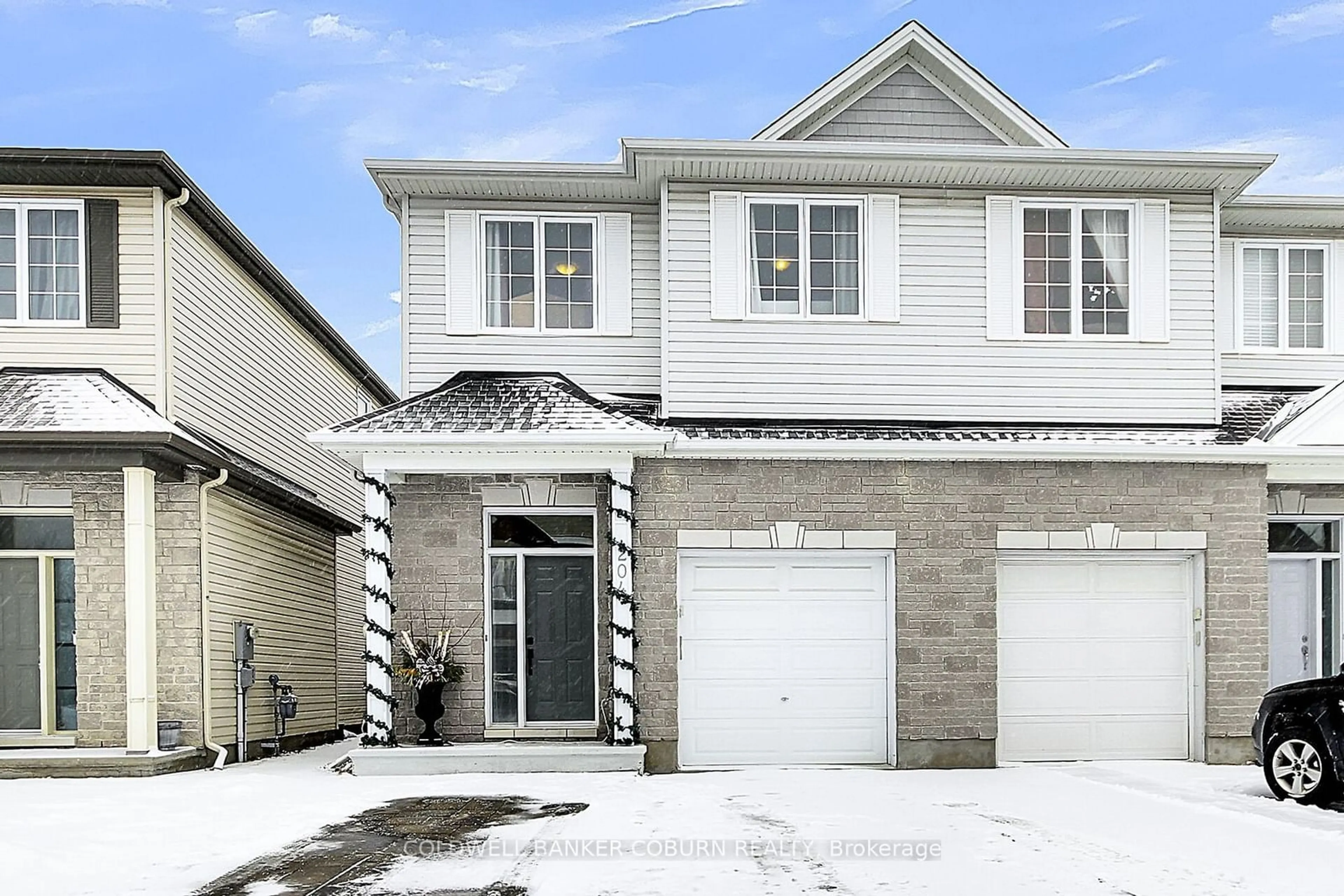 Home with vinyl exterior material, street for 204 Broxburn Cres, Barrhaven Ontario K2J 0N7