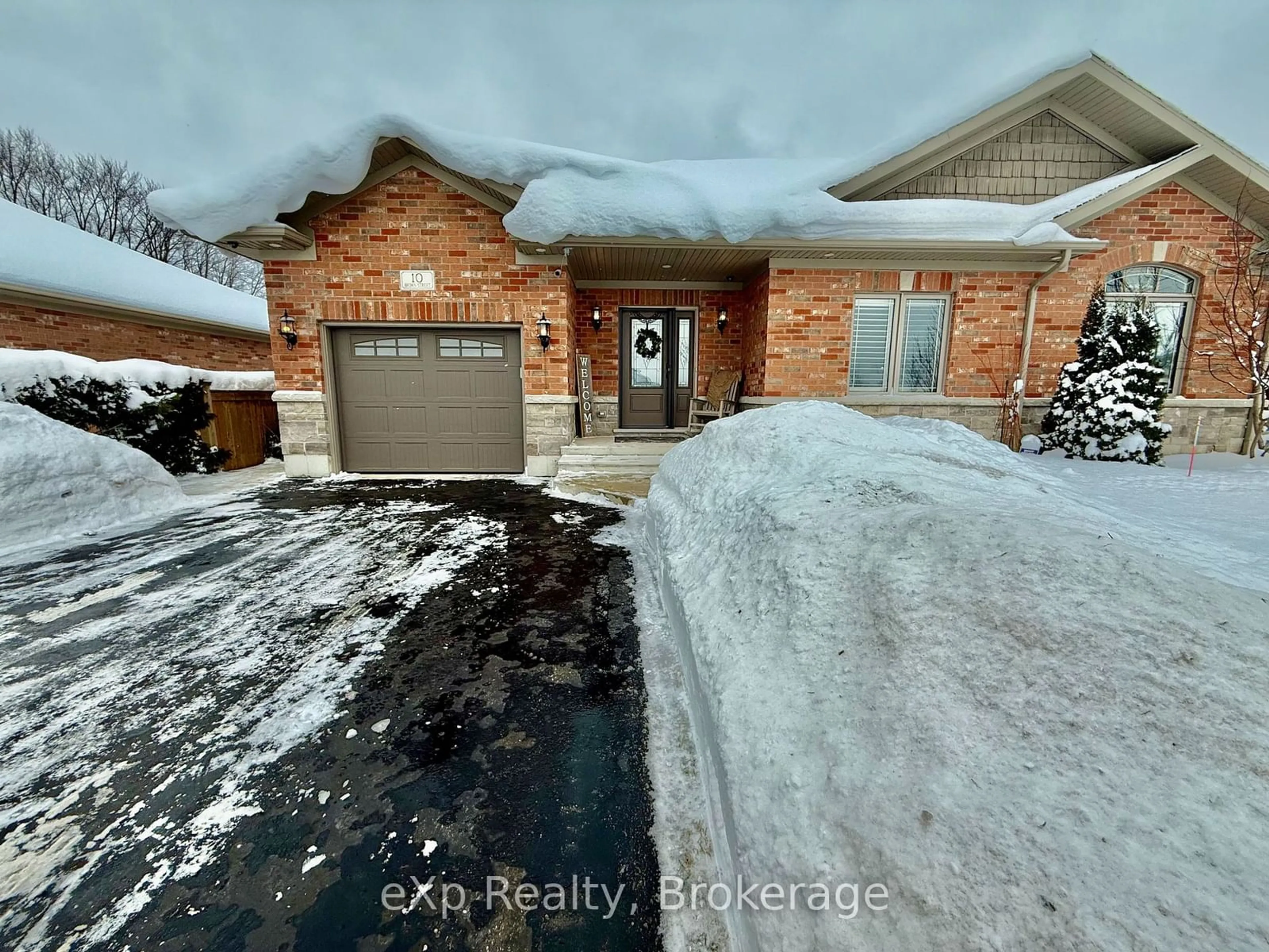 A pic from outside/outdoor area/front of a property/back of a property/a pic from drone, street for 10 Brown St, Minto Ontario N0G 1M0