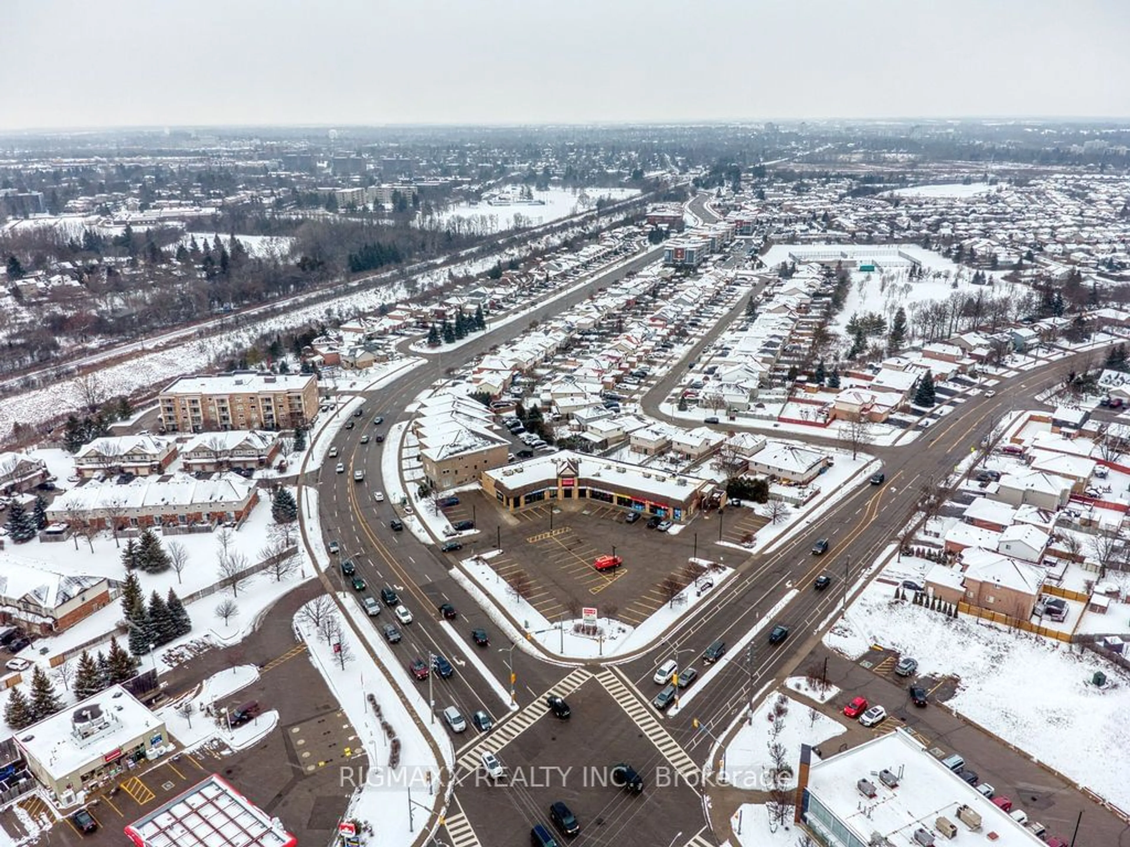 A pic from outside/outdoor area/front of a property/back of a property/a pic from drone, street for 904 PAISLEY Rd #211, Guelph Ontario N1K 0C6