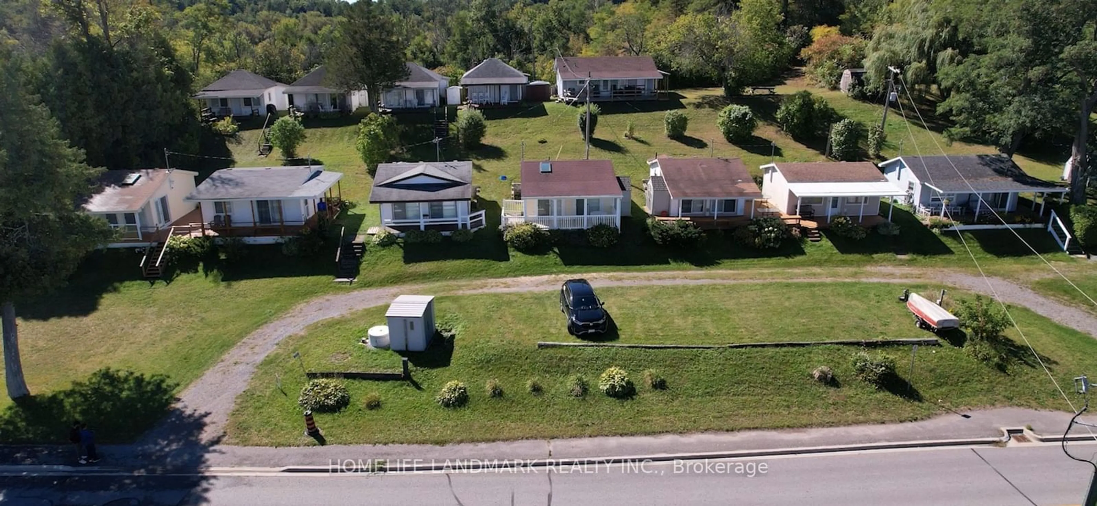 A pic from outside/outdoor area/front of a property/back of a property/a pic from drone, street for 5026 Rice Lake Dr, Hamilton Township Ontario K0L 1E0