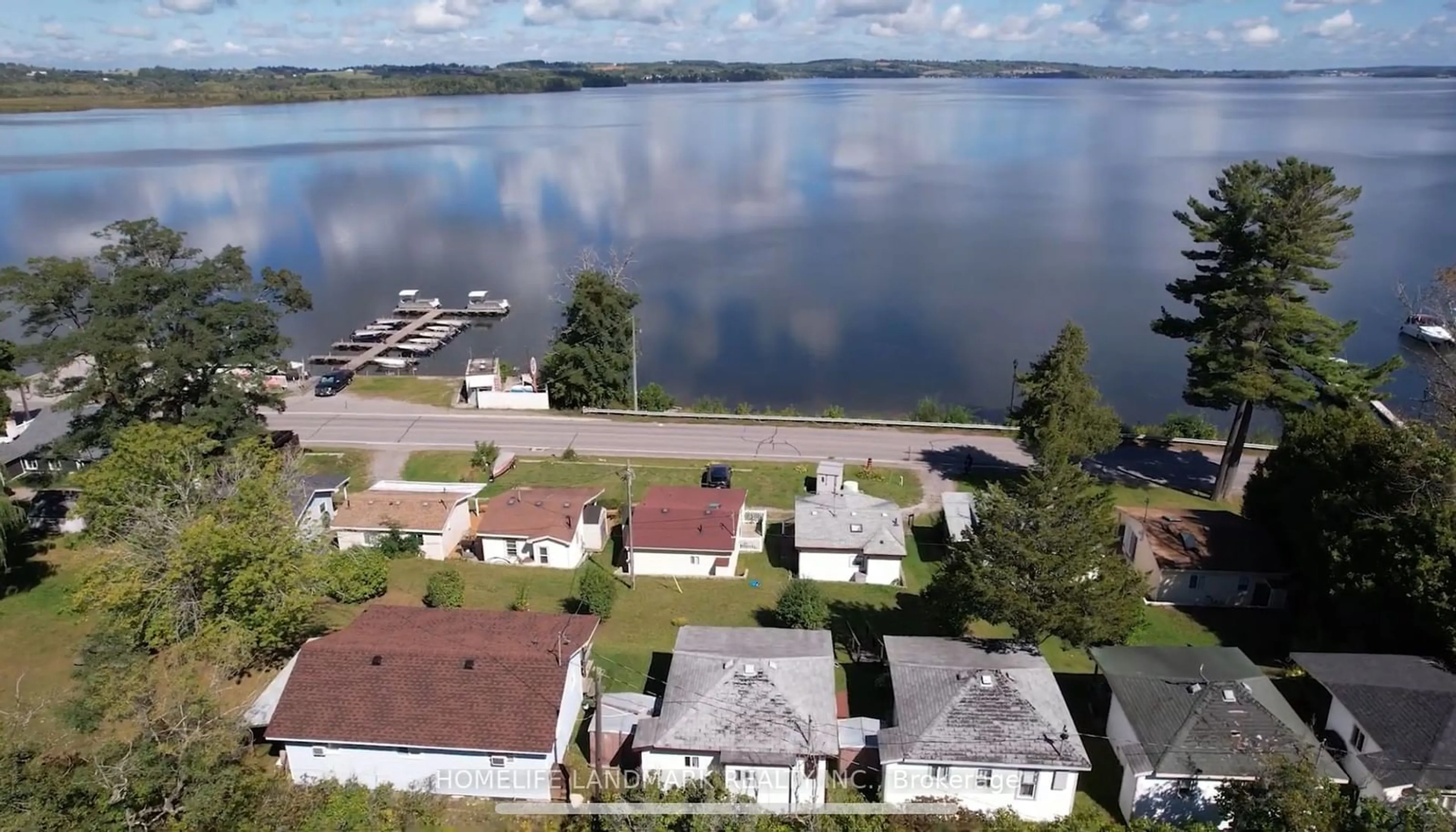 A pic from outside/outdoor area/front of a property/back of a property/a pic from drone, water/lake/river/ocean view for 5026 Rice Lake Dr, Hamilton Township Ontario K0L 1E0