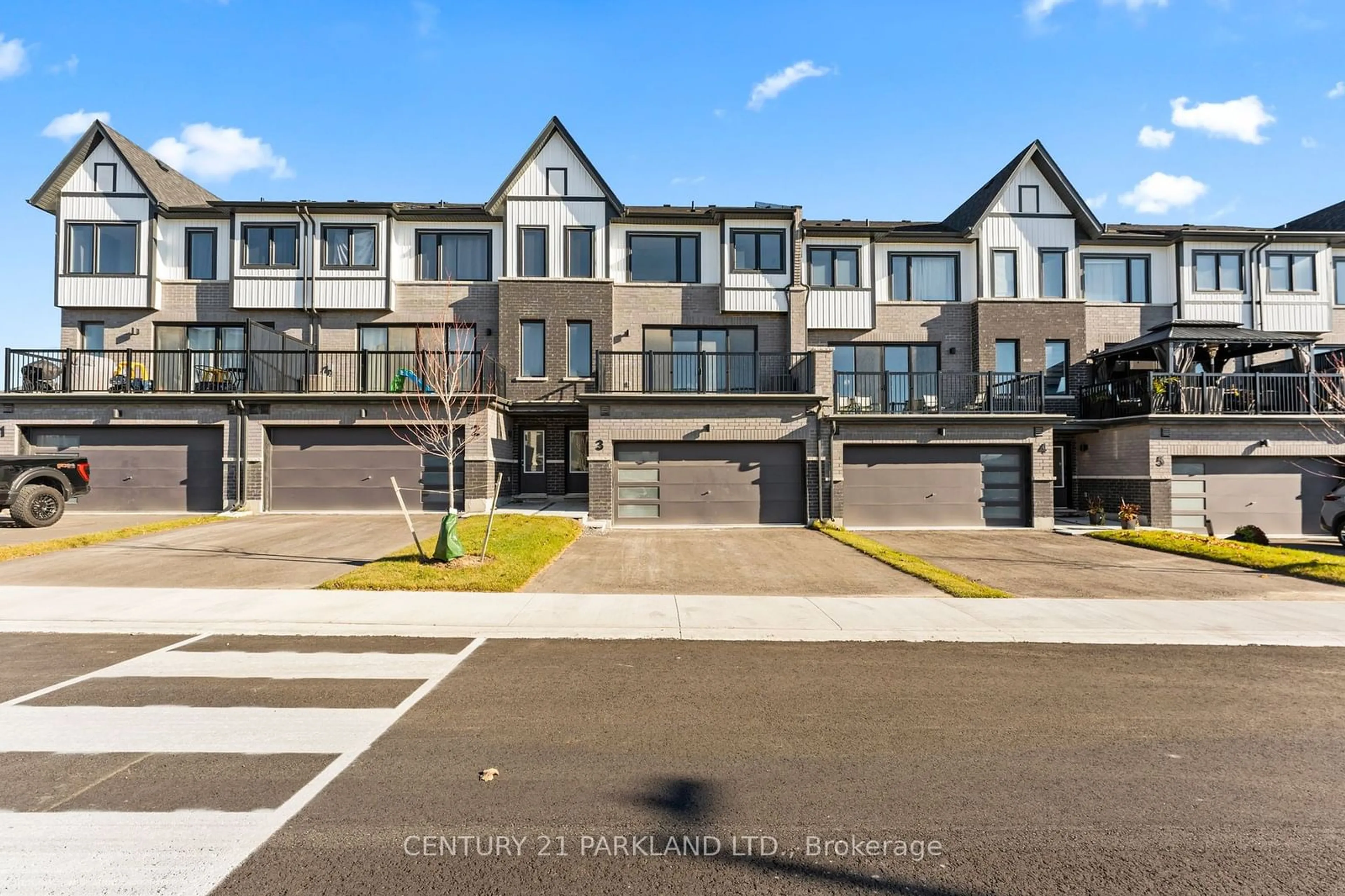 A pic from outside/outdoor area/front of a property/back of a property/a pic from drone, street for 160 Densmore Rd ##3, Cobourg Ontario K9A 4J9