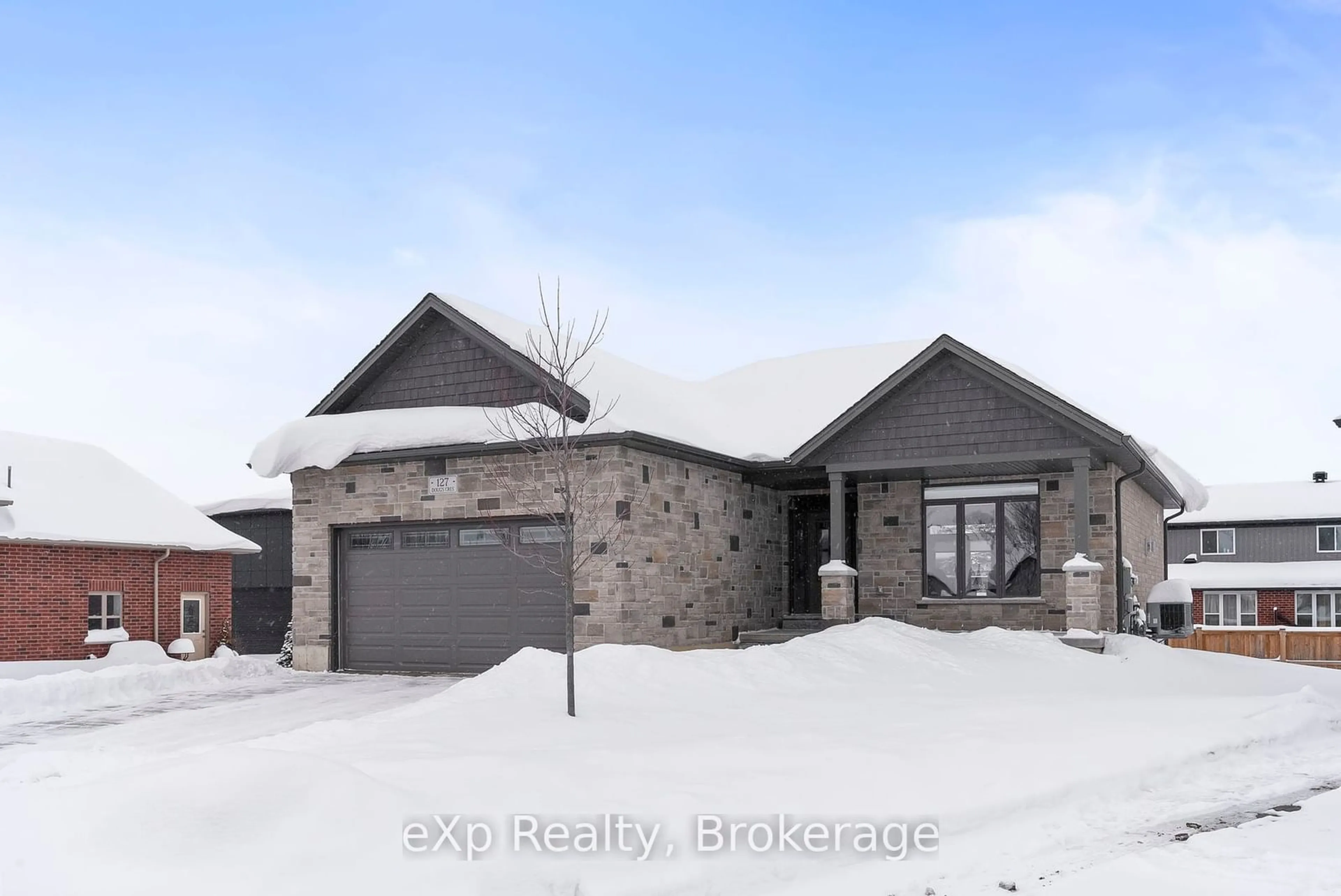 Home with brick exterior material, street for 127 DOUGS Cres, Wellington North Ontario N0G 2L4