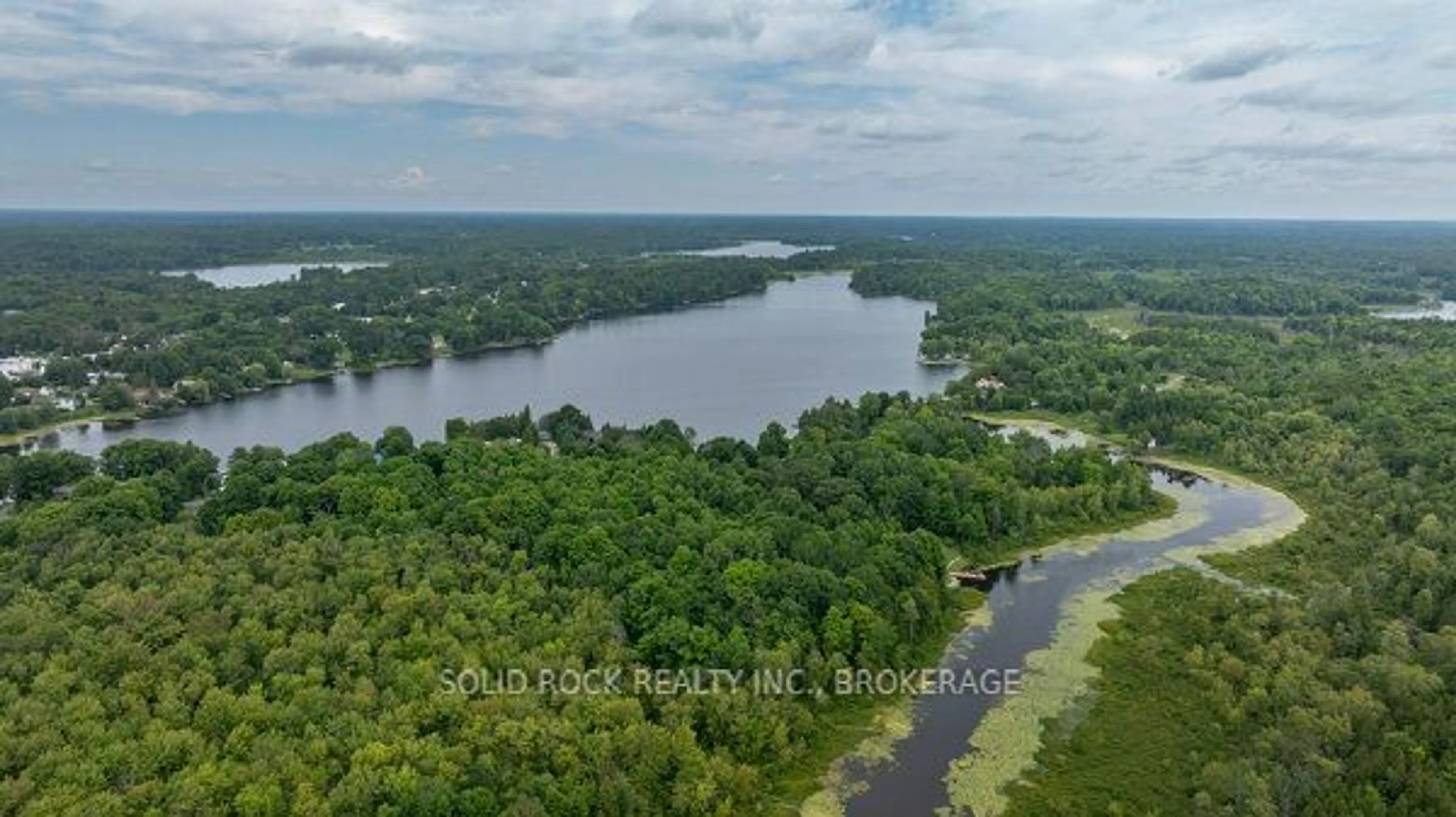 A pic from outside/outdoor area/front of a property/back of a property/a pic from drone, water/lake/river/ocean view for 5915 Davey Dr, South Frontenac Ontario K0H 2W0