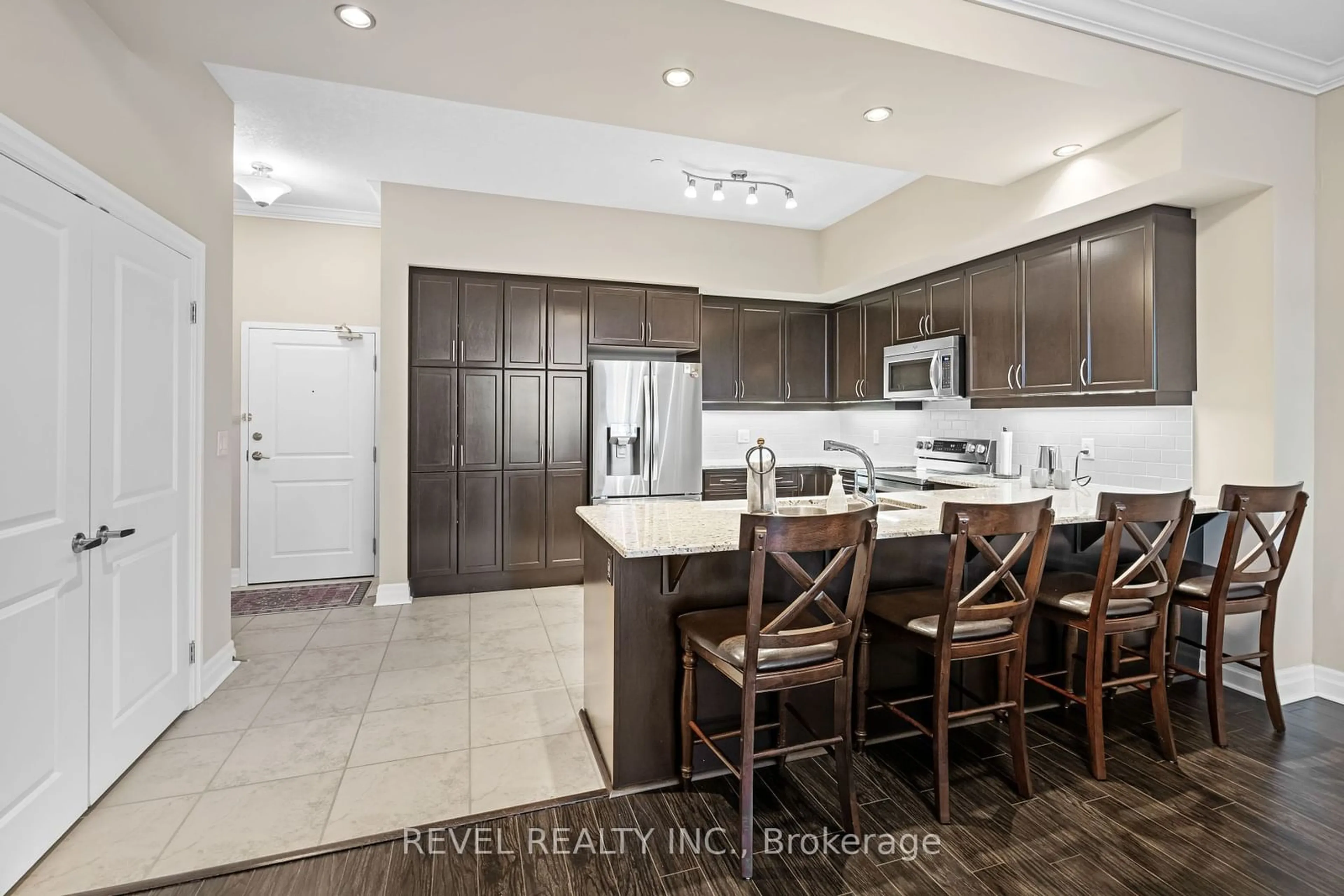 Open concept kitchen, ceramic/tile floor for 240 Village Walk Blvd #1105, London Ontario N6G 0P6