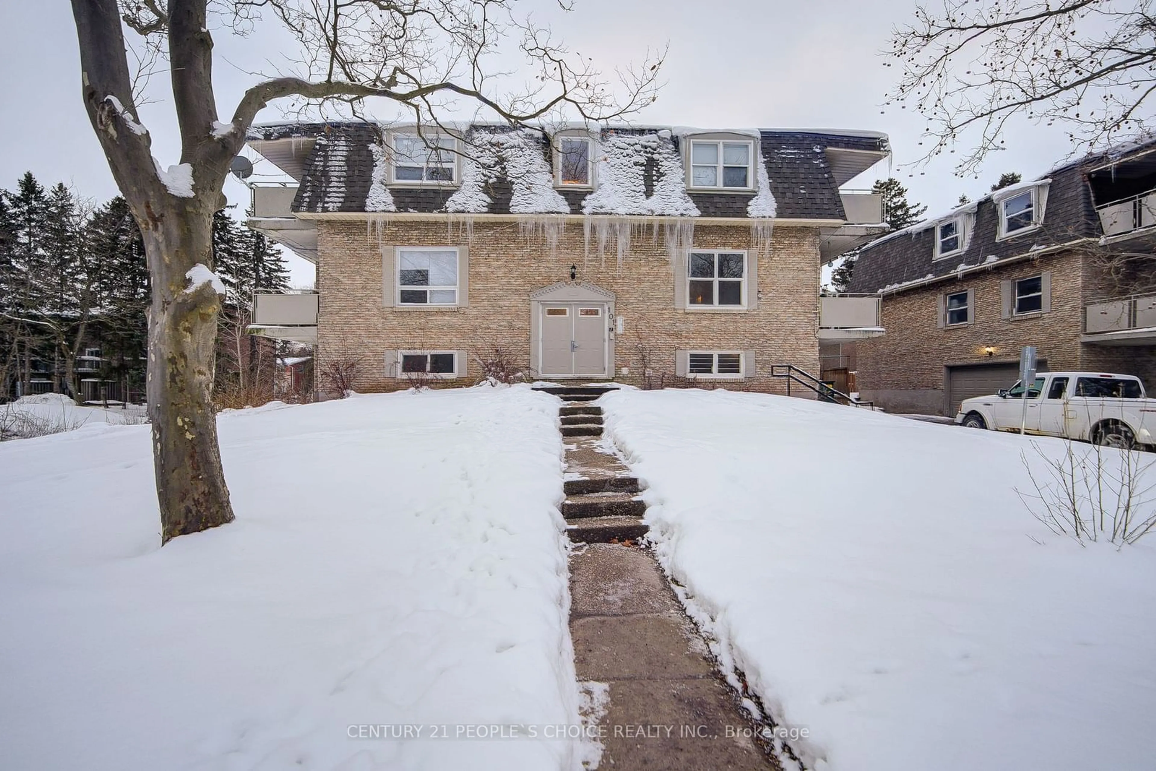 A pic from outside/outdoor area/front of a property/back of a property/a pic from drone, street for 101 Westmount Rd #2, Waterloo Ontario N2L 5G5