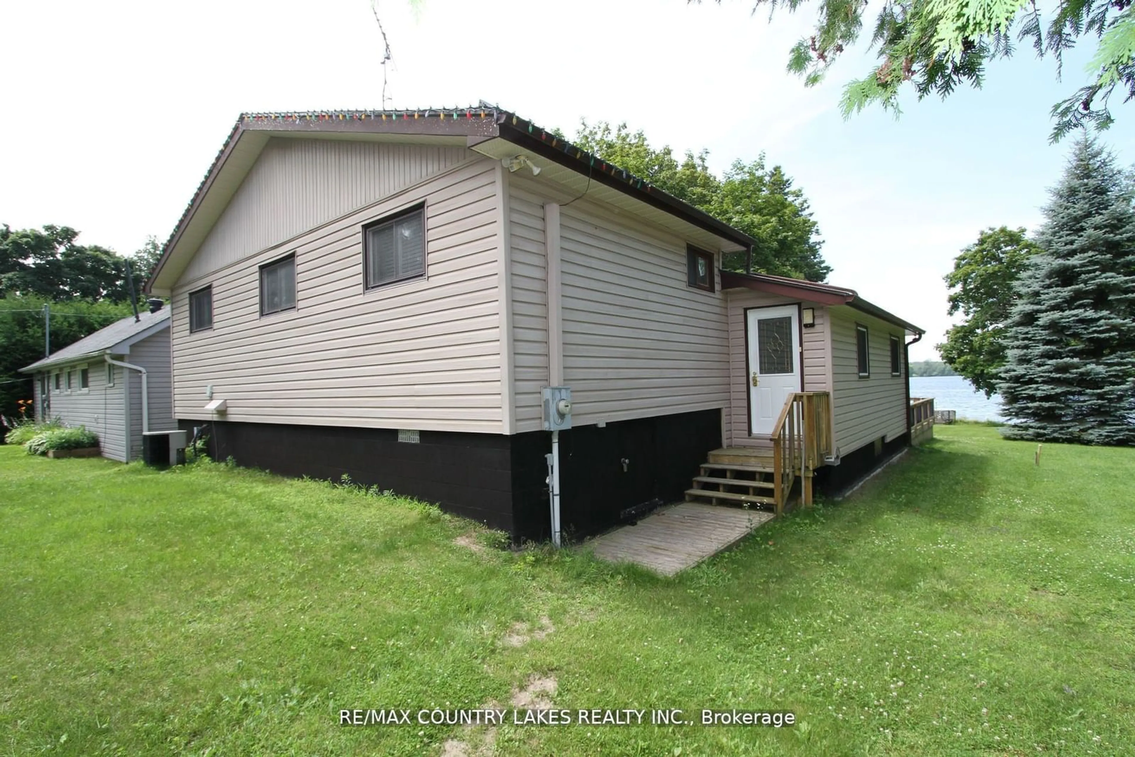 Home with vinyl exterior material, building for 80-82 Antiquary Rd, Kawartha Lakes Ontario K0M 2B0