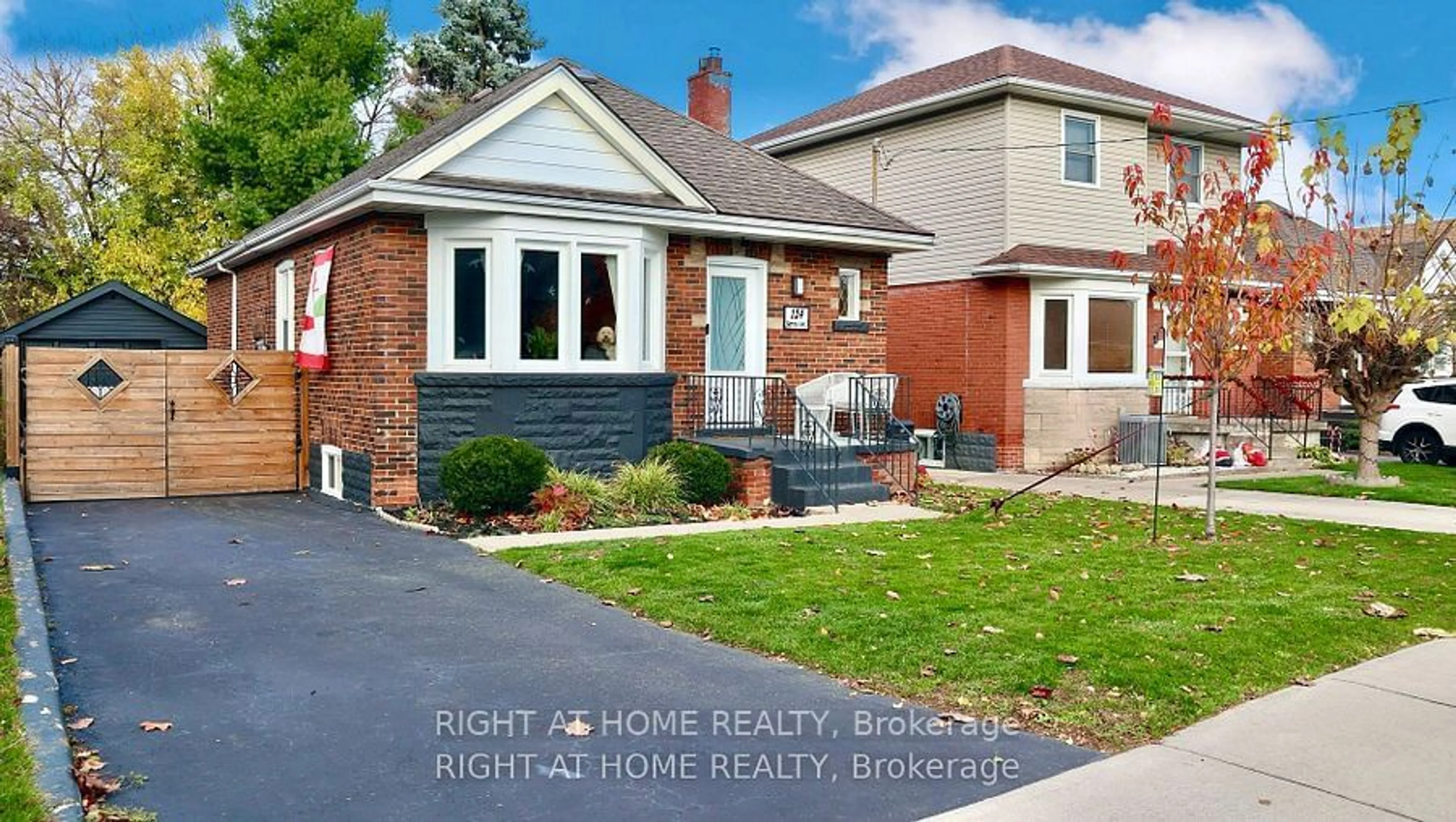 Home with brick exterior material, street for 124 Barons Ave, Hamilton Ontario L8K 2Y7