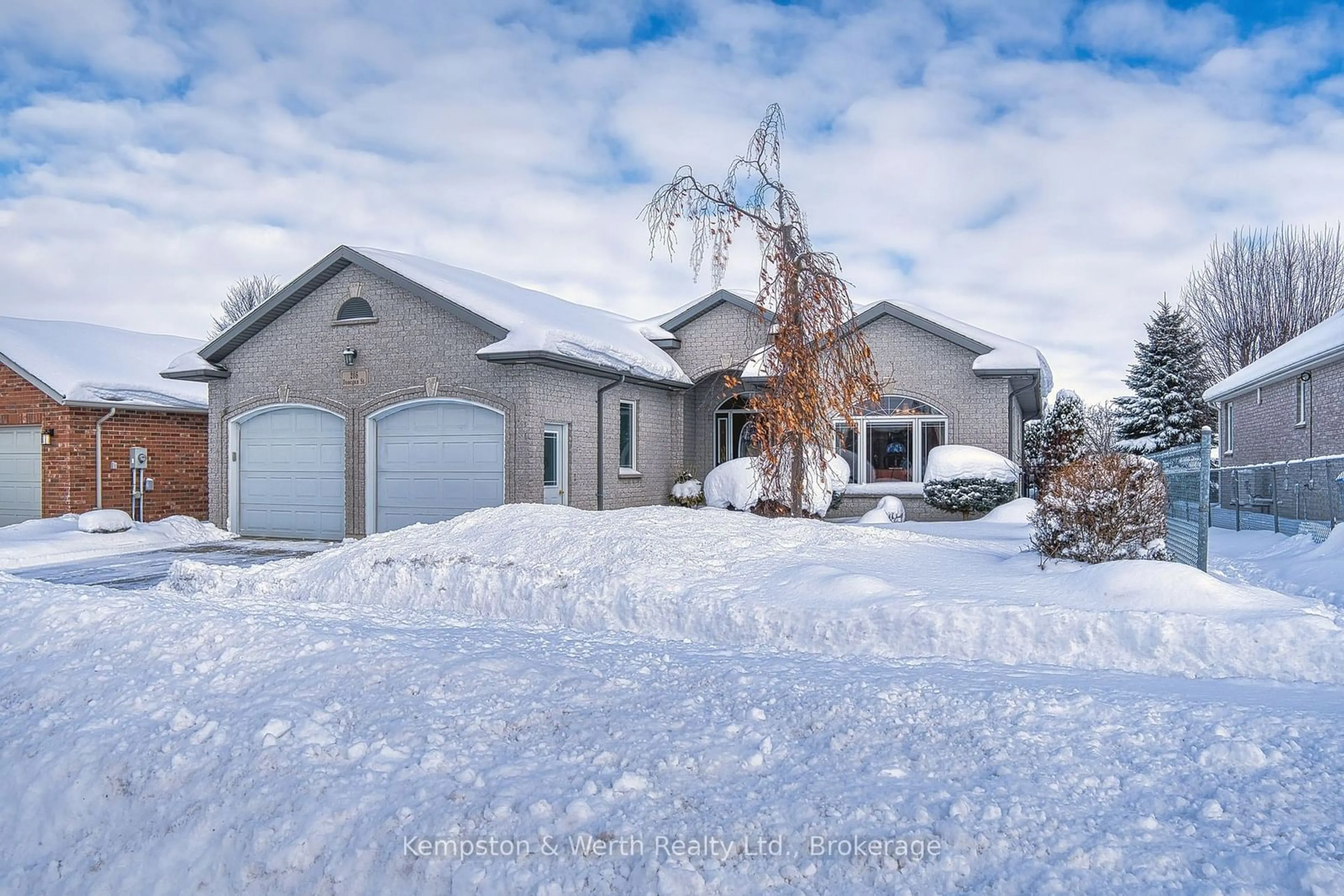 A pic from outside/outdoor area/front of a property/back of a property/a pic from drone, street for 205 Donegan St, North Perth Ontario N4W 3V5
