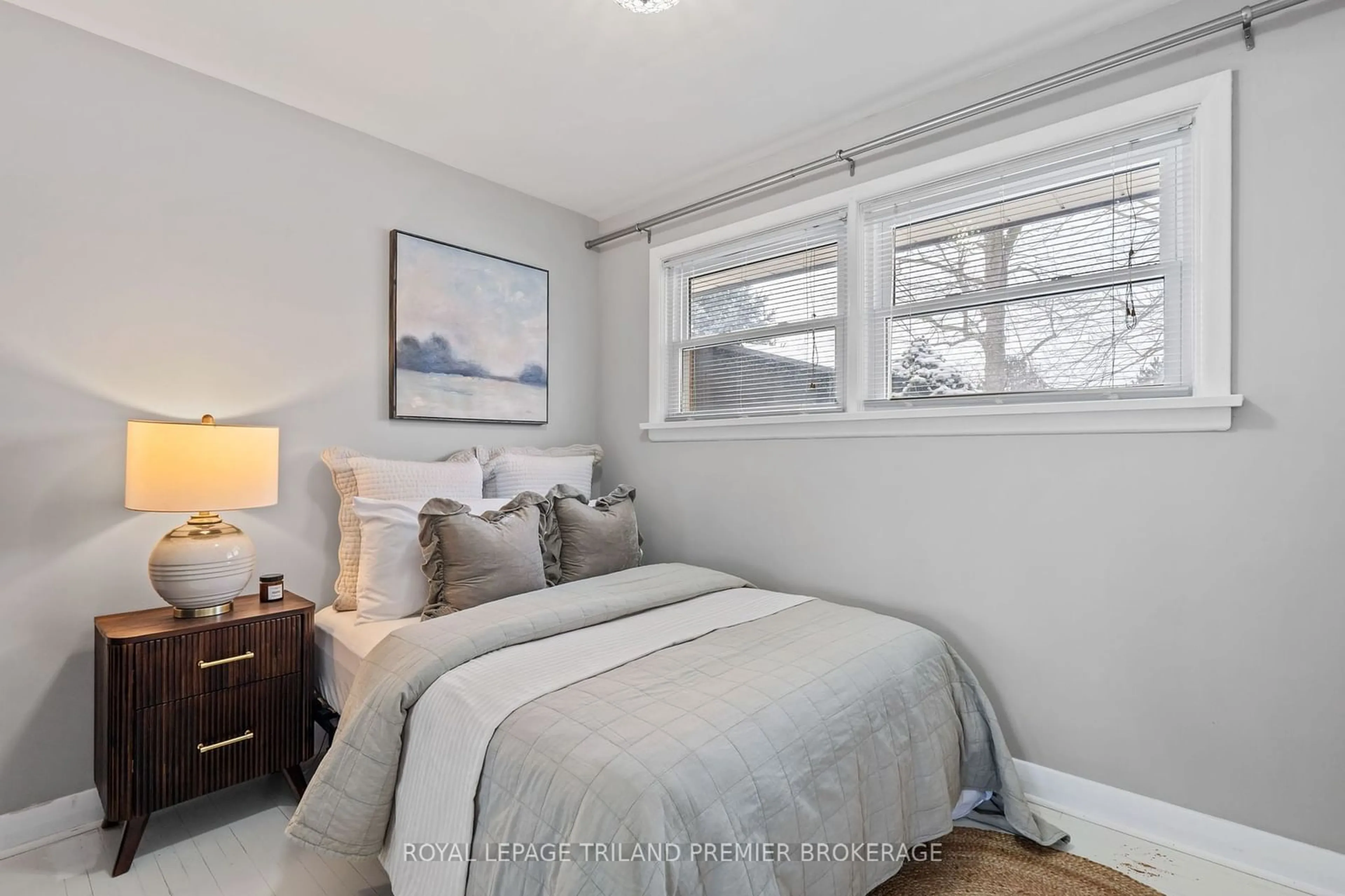 Bedroom with bed, wood/laminate floor for 443 Beachwood Ave, London Ontario N6J 3J9