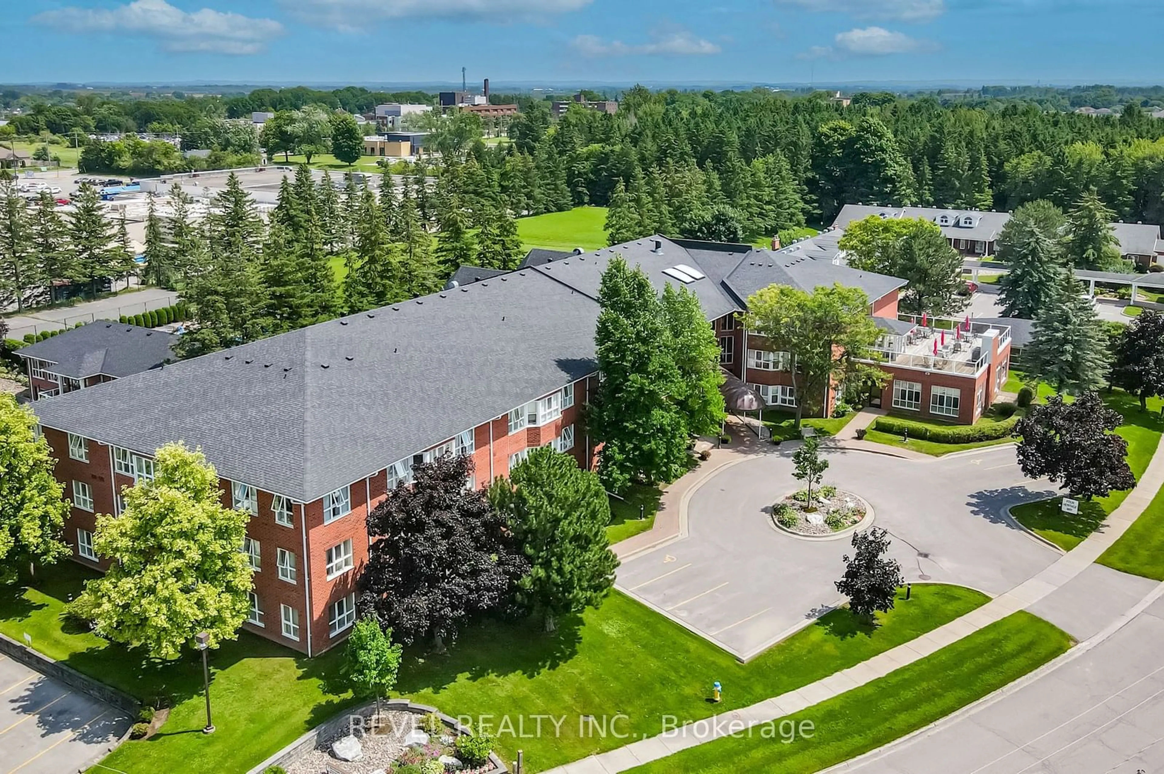 A pic from outside/outdoor area/front of a property/back of a property/a pic from drone, unknown for 4 Heritage Way #308, Kawartha Lakes Ontario K9V 5Z2