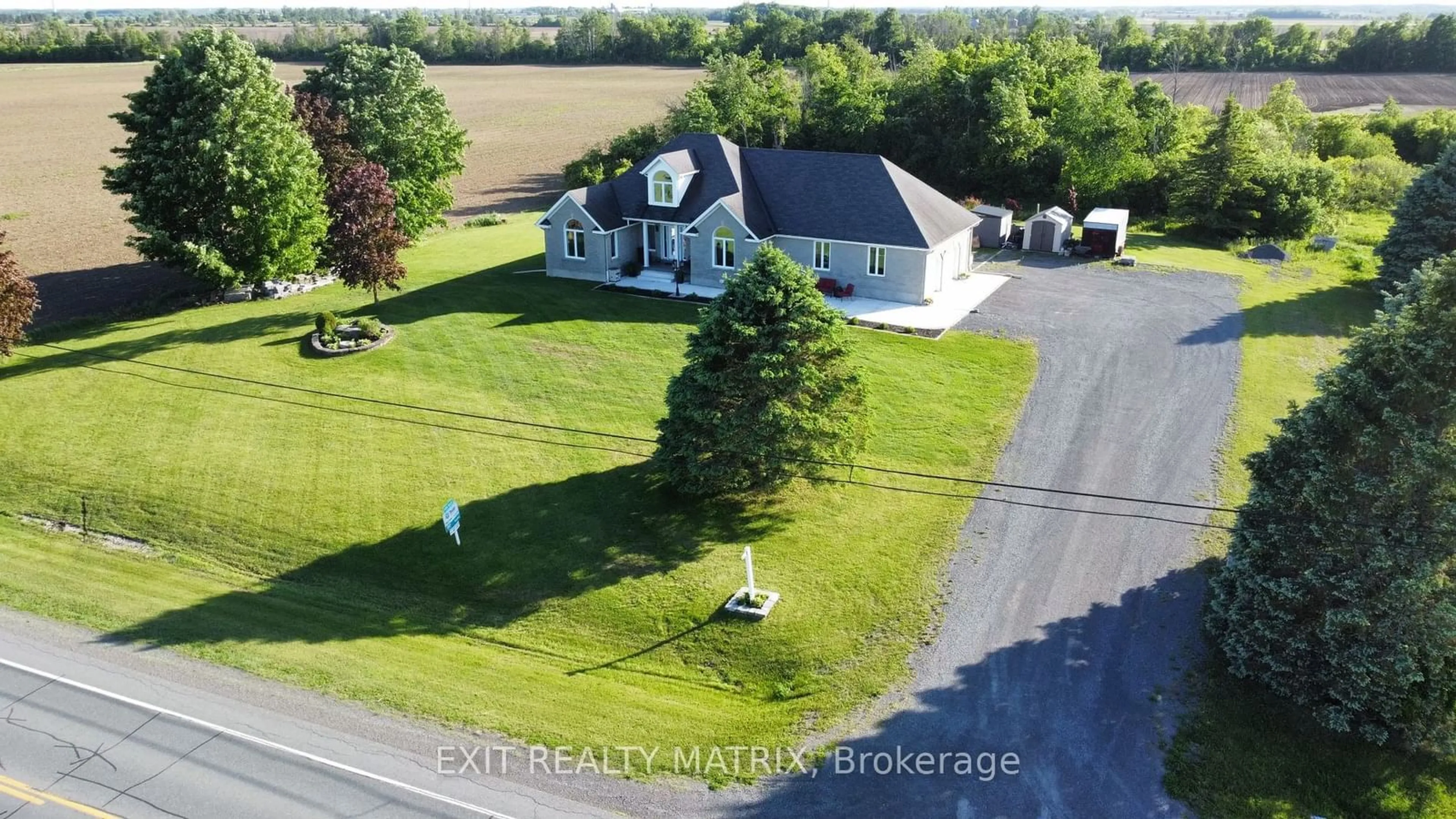 A pic from outside/outdoor area/front of a property/back of a property/a pic from drone, street for 2248 County 12 Rd, North Stormont Ontario K0C 1G0