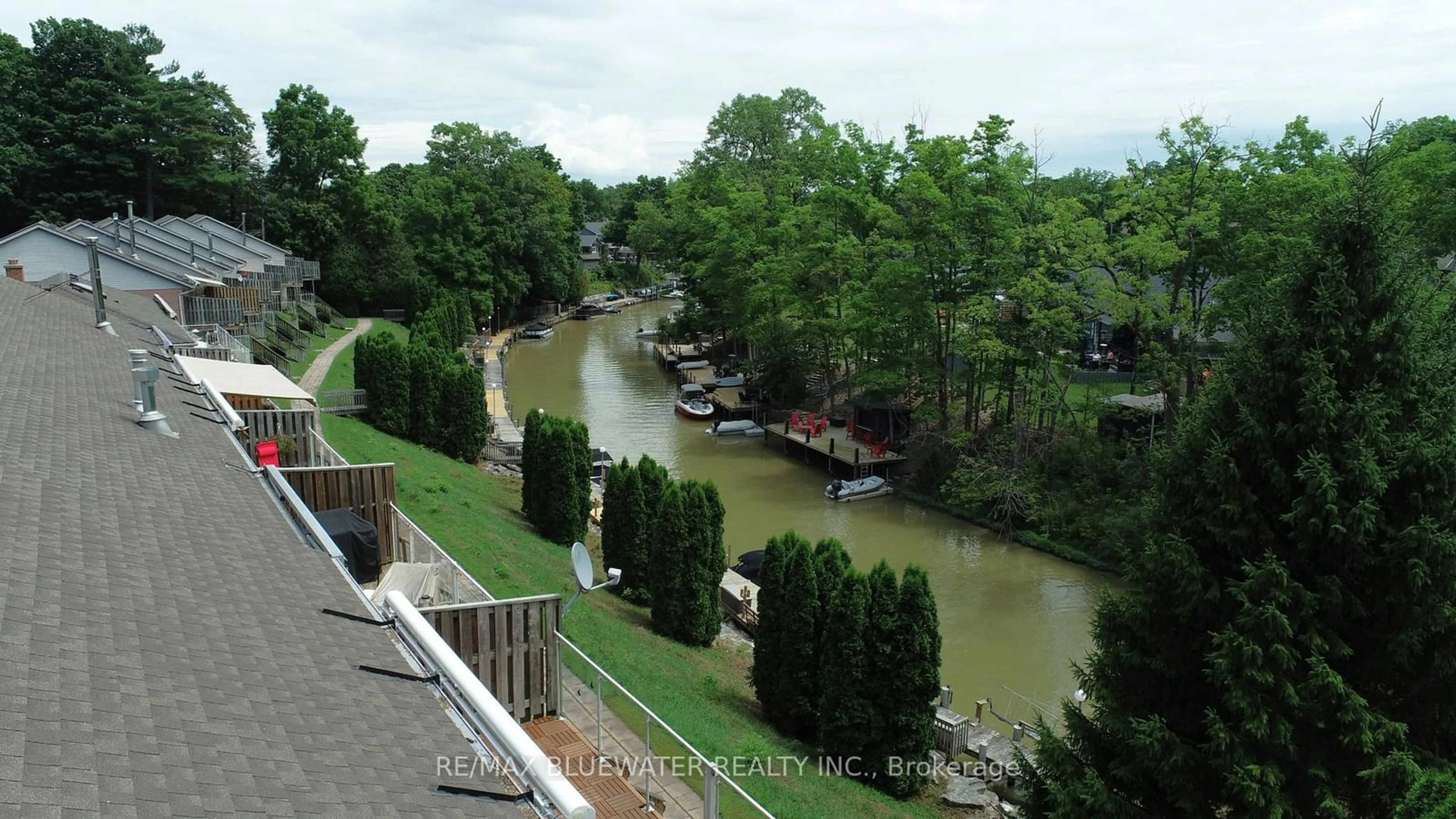 A pic from outside/outdoor area/front of a property/back of a property/a pic from drone, water/lake/river/ocean view for 90 ONTARIO St #24, Lambton Shores Ontario N0M 1T0