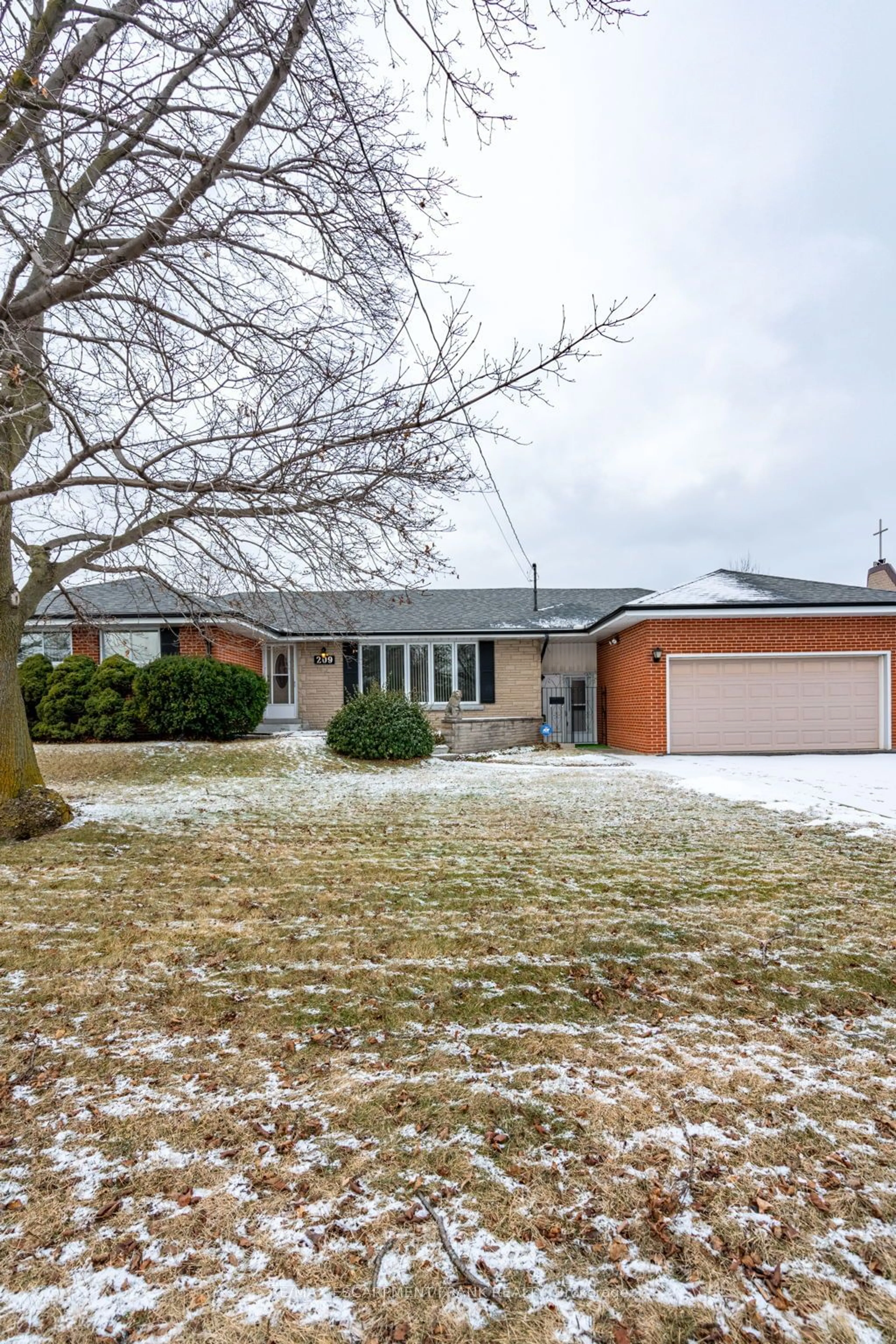 Home with brick exterior material, street for 209 Nash Rd, Hamilton Ontario L8H 2P8