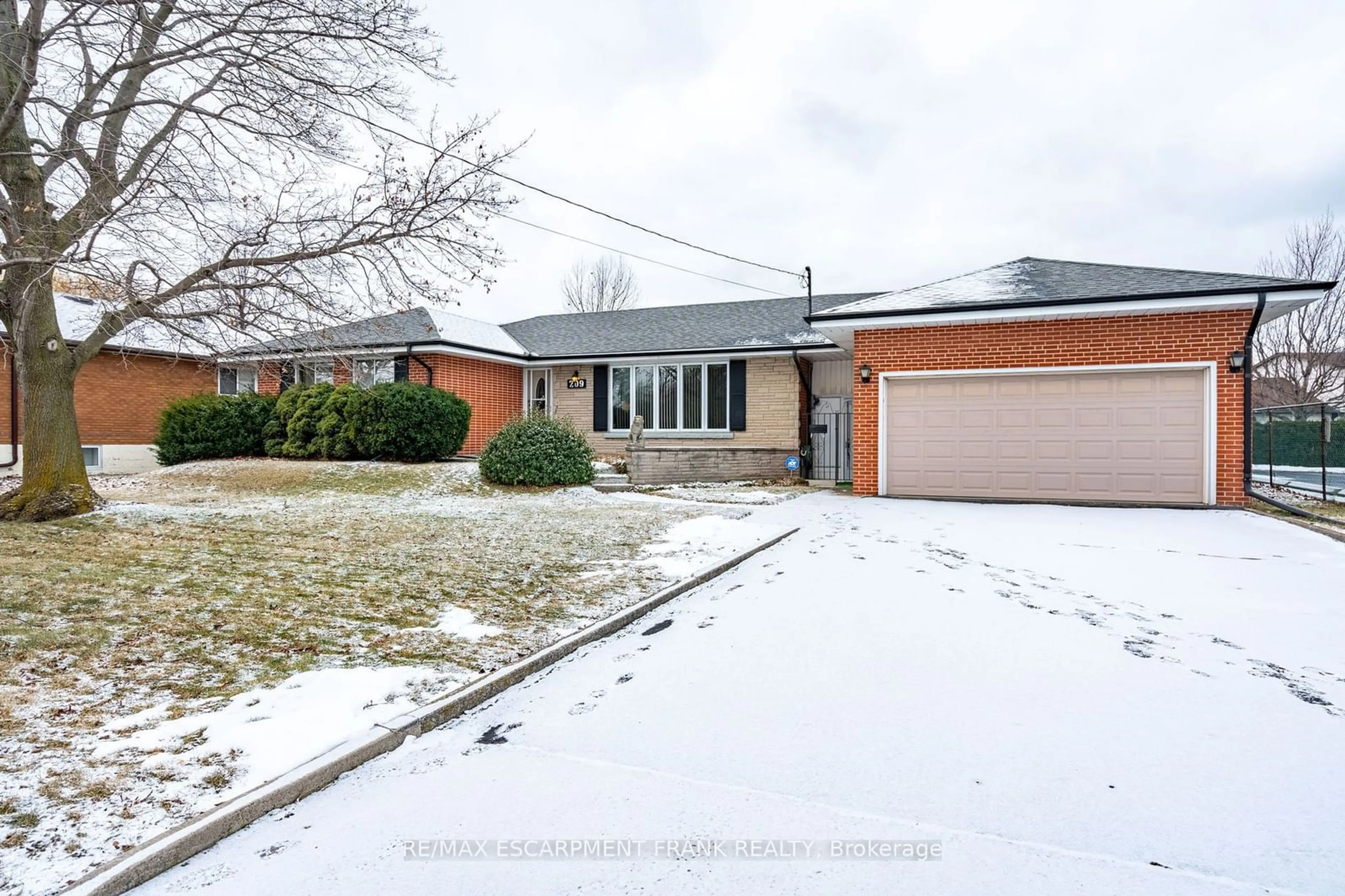 Home with brick exterior material, street for 209 Nash Rd, Hamilton Ontario L8H 2P8