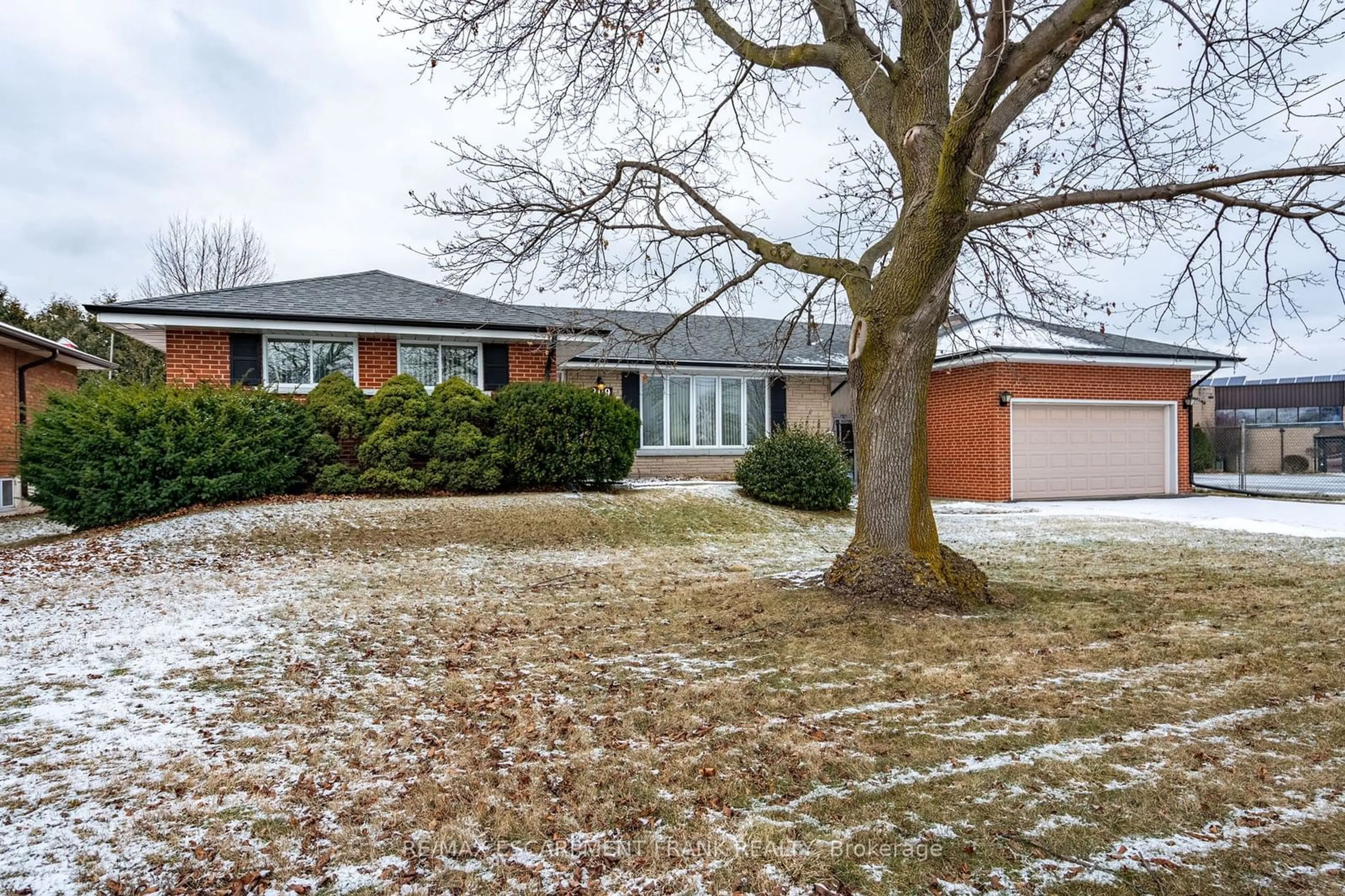 Home with brick exterior material, street for 209 Nash Rd, Hamilton Ontario L8H 2P8