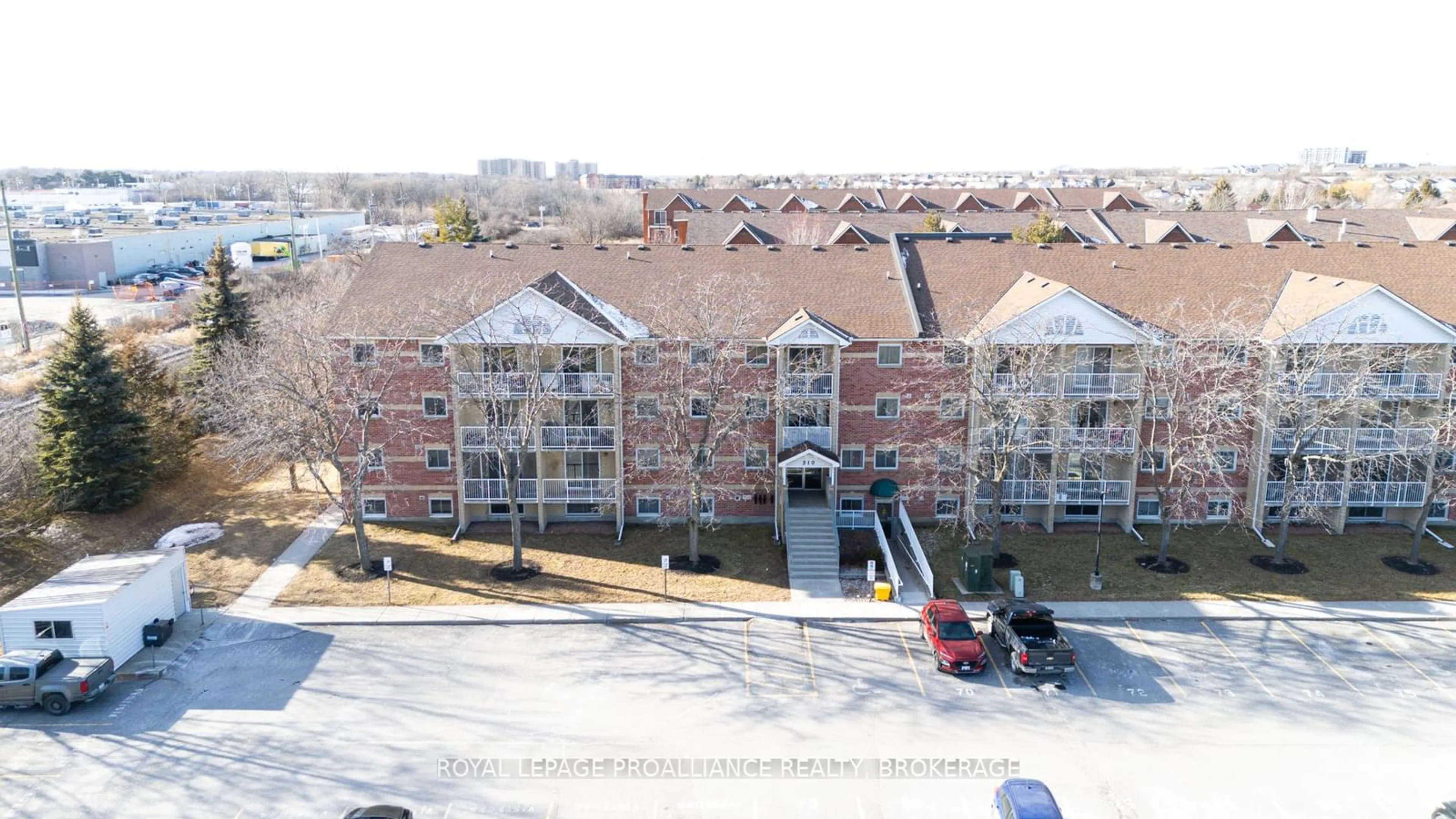 A pic from outside/outdoor area/front of a property/back of a property/a pic from drone, unknown for 310 Kingsdale Ave #403, Kingston Ontario K7M 8S1