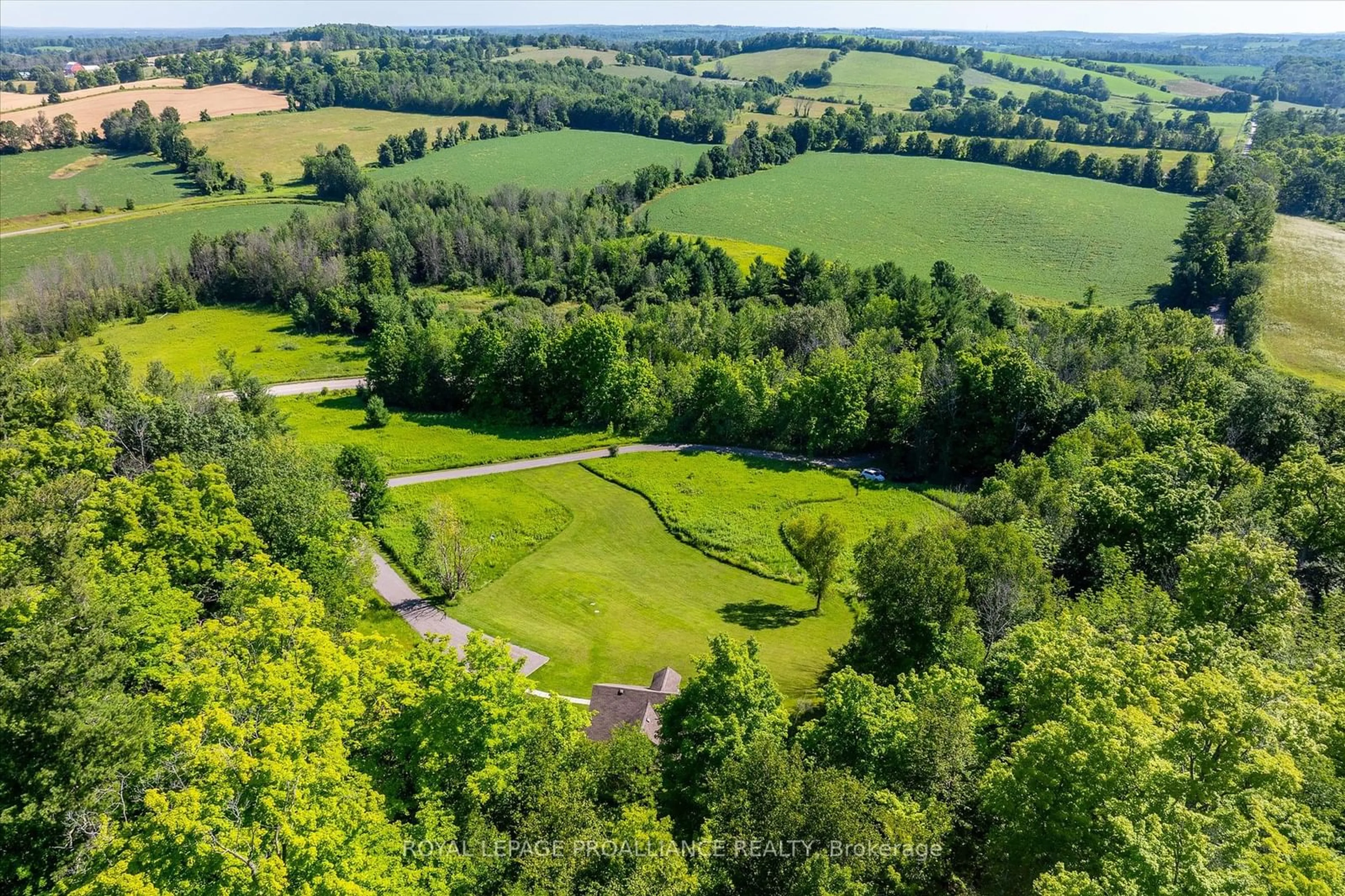 A pic from outside/outdoor area/front of a property/back of a property/a pic from drone, forest/trees view for 582 River Rd, Asphodel-Norwood Ontario K0L 1Y0