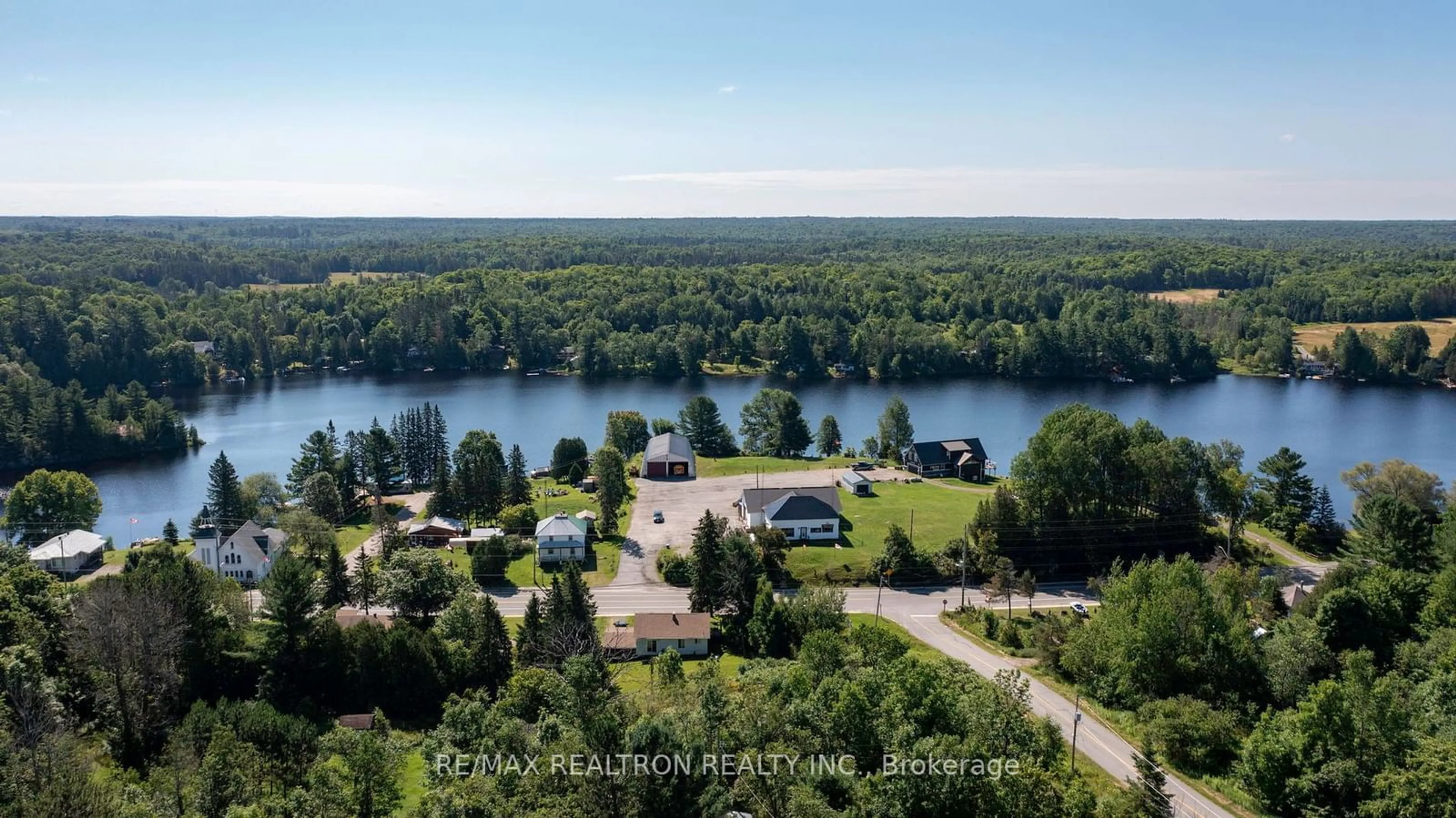 A pic from outside/outdoor area/front of a property/back of a property/a pic from drone, water/lake/river/ocean view for 2250 Hwy 124, Whitestone Ontario P0A 1G0