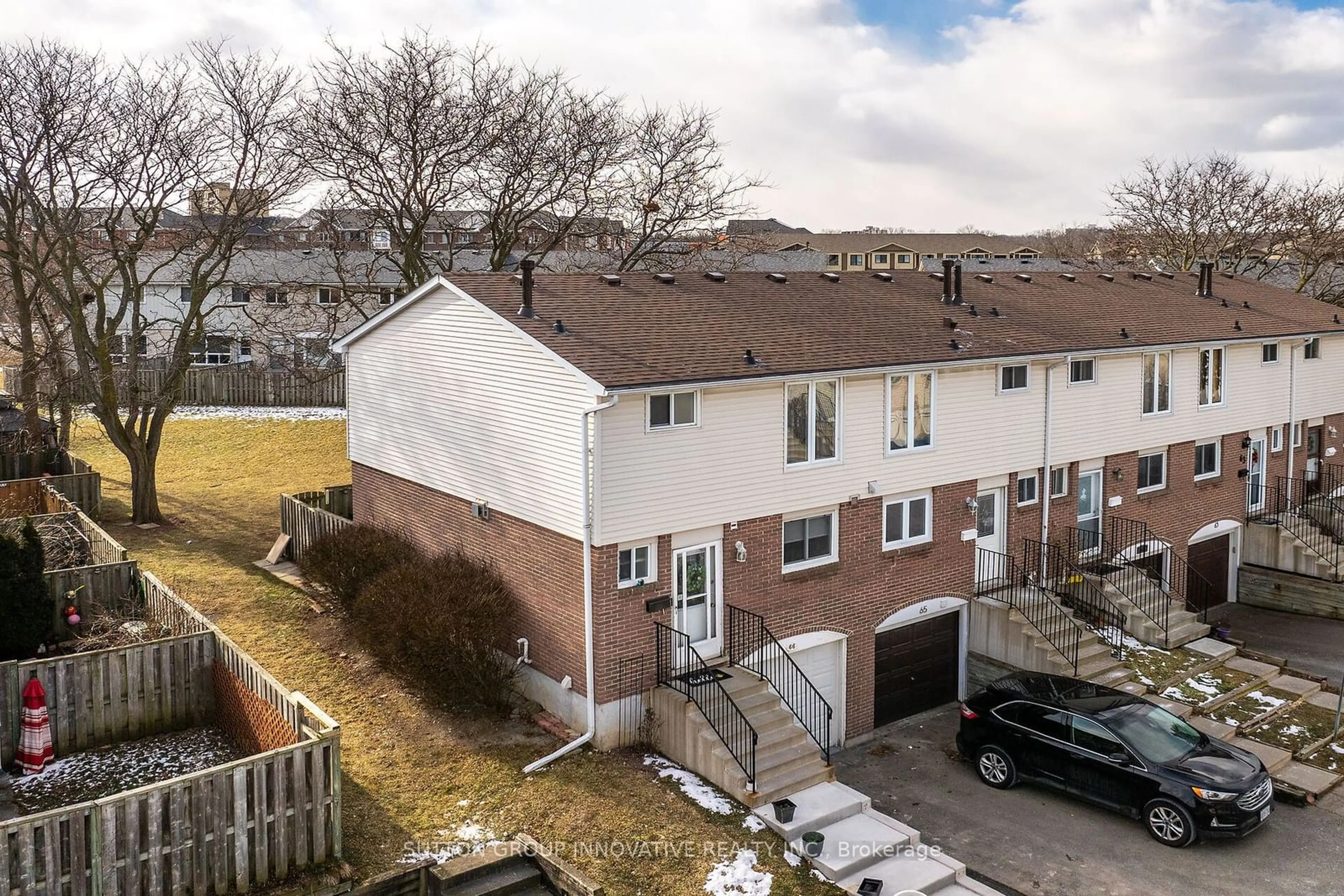 A pic from outside/outdoor area/front of a property/back of a property/a pic from drone, street for 120 Quigley Rd #66, Hamilton Ontario L8K 6L4