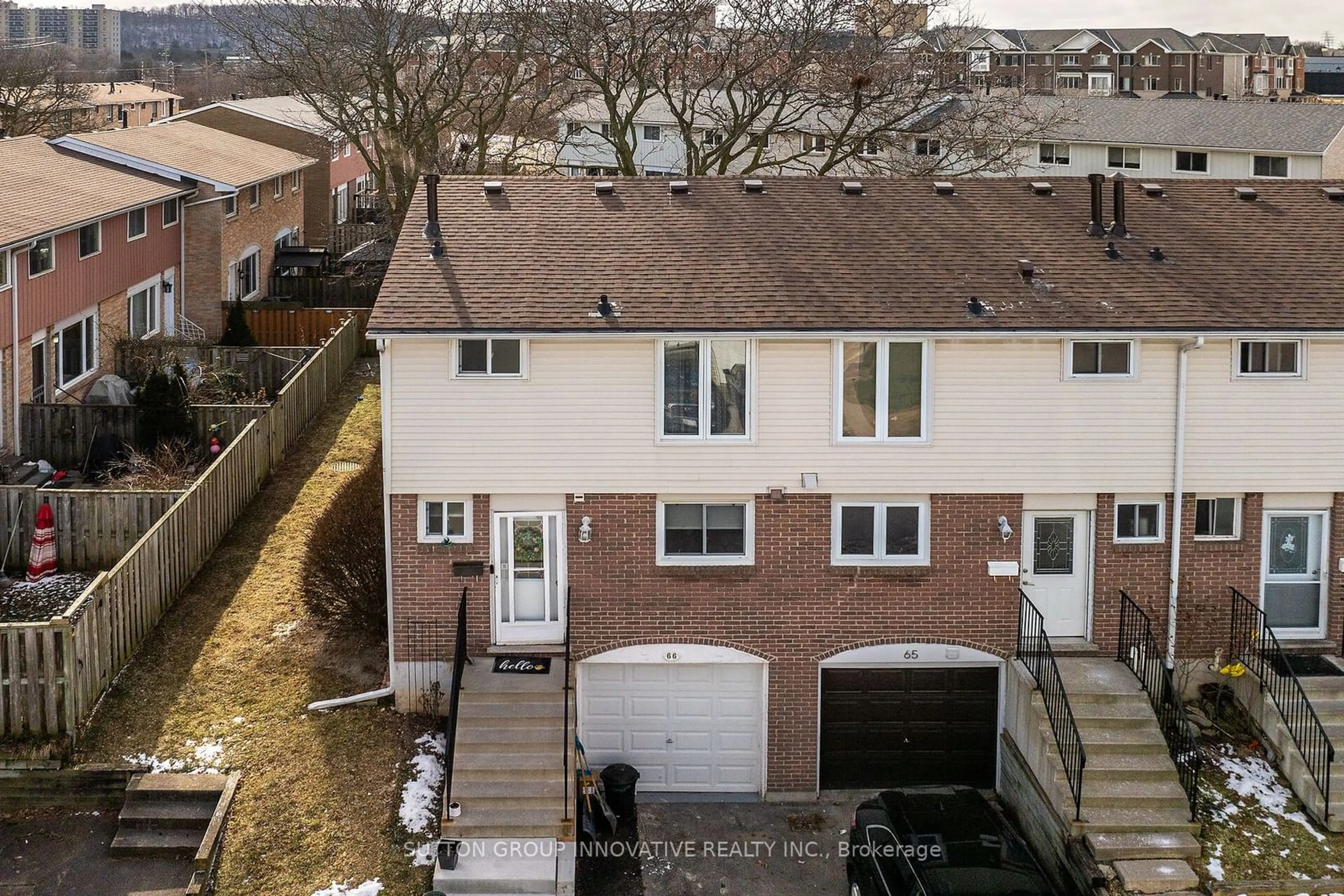 A pic from outside/outdoor area/front of a property/back of a property/a pic from drone, street for 120 Quigley Rd #66, Hamilton Ontario L8K 6L4