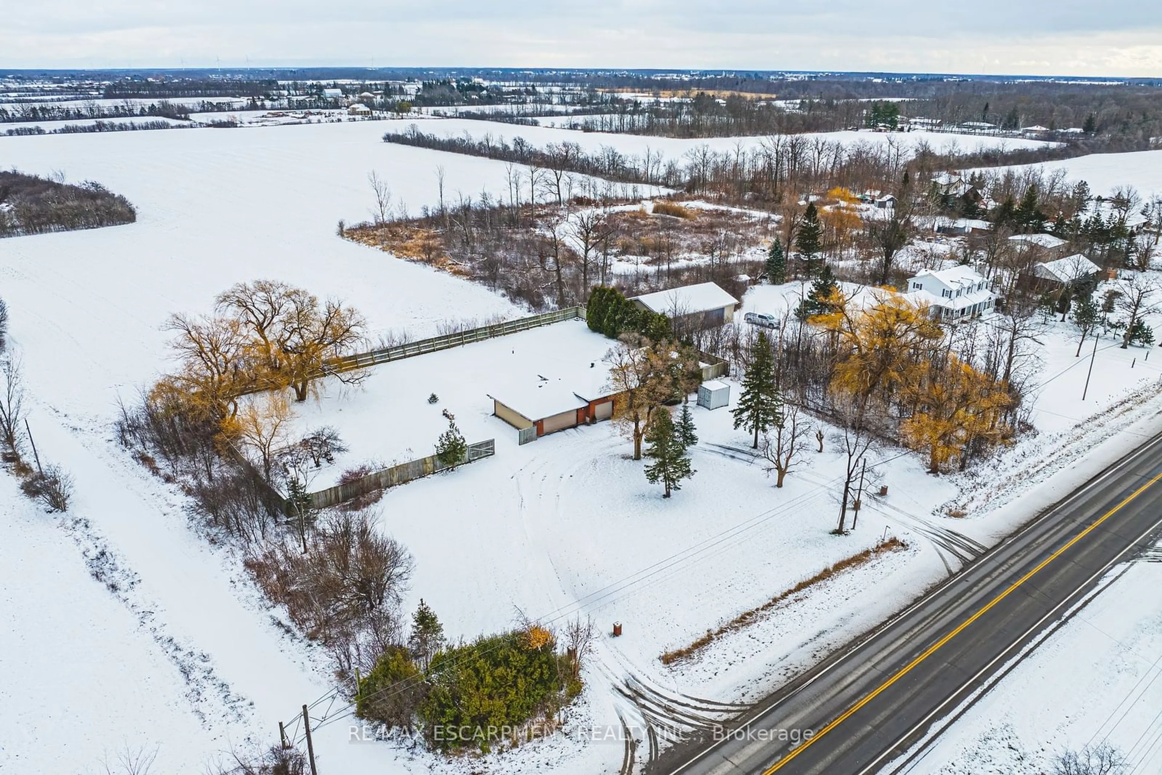 A pic from outside/outdoor area/front of a property/back of a property/a pic from drone, street for 485 56 Highway, Hamilton Ontario L0R 1P0