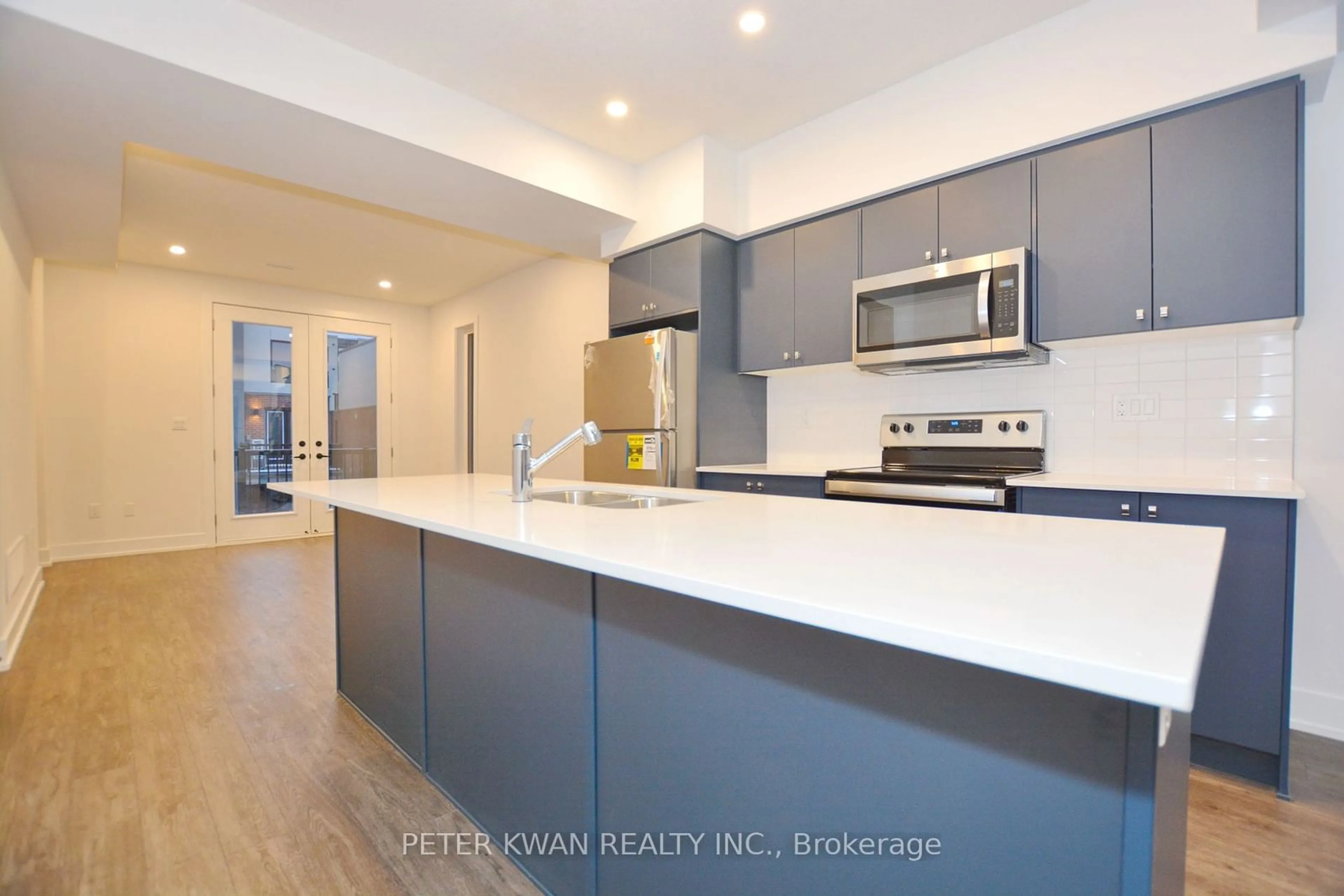 Open concept kitchen, ceramic/tile floor for 99 Roger St #12, Waterloo Ontario N2J 0G1