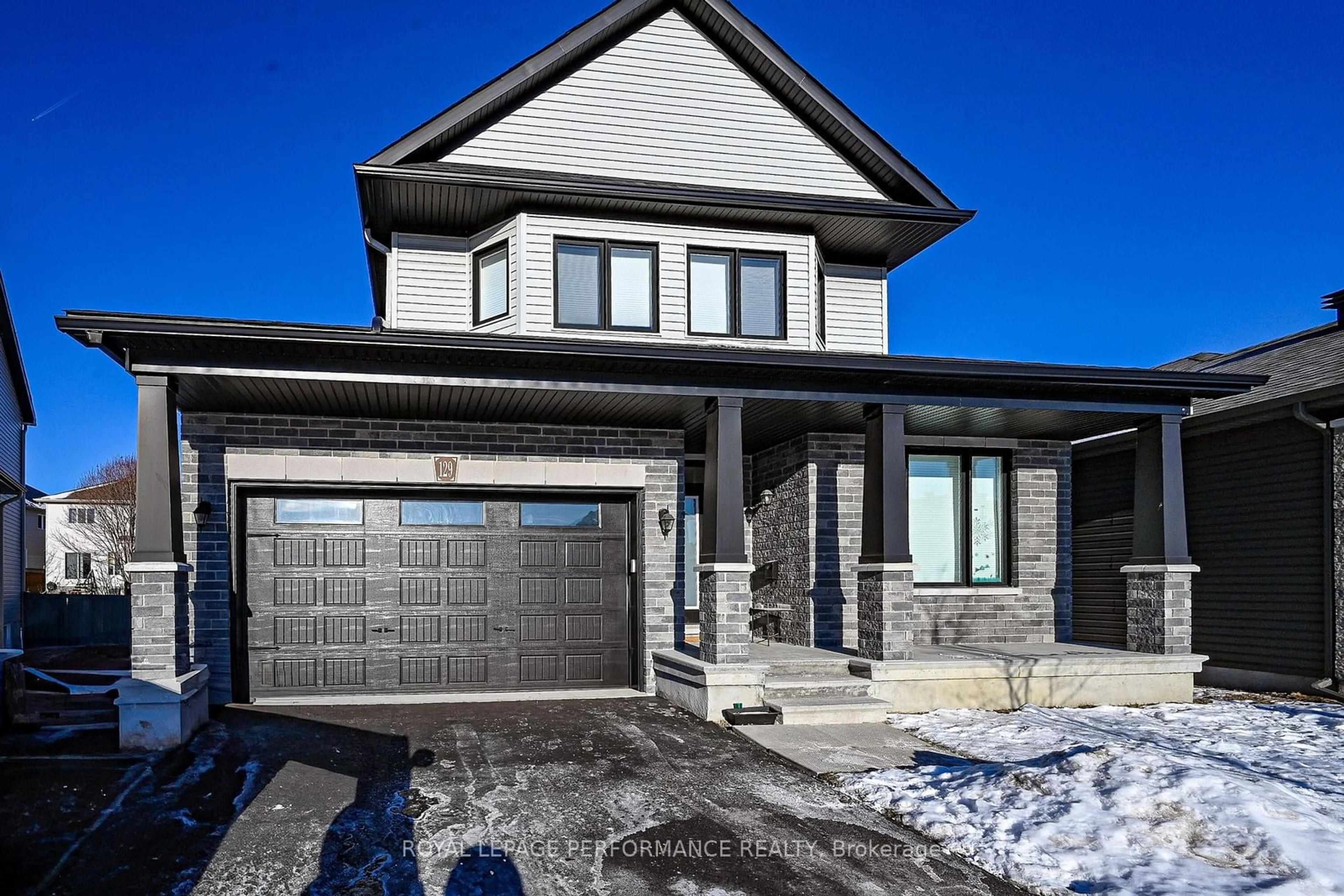 Home with brick exterior material, street for 129 Hickstead Way, Stittsville - Munster - Richmond Ontario K2S 0Z5