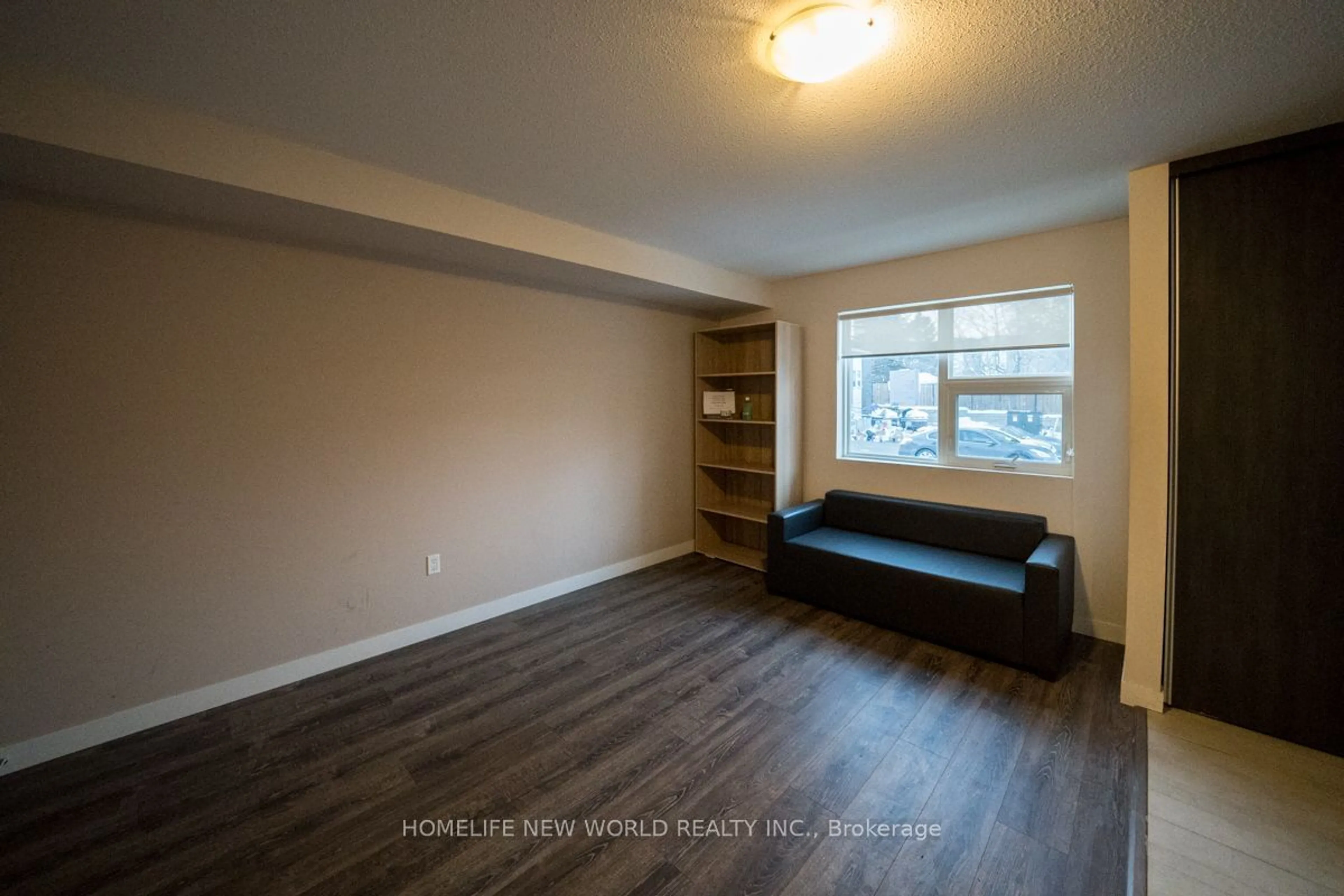 Living room with furniture, wood/laminate floor for 288 Albert St #116, Waterloo Ontario N2L 0G9