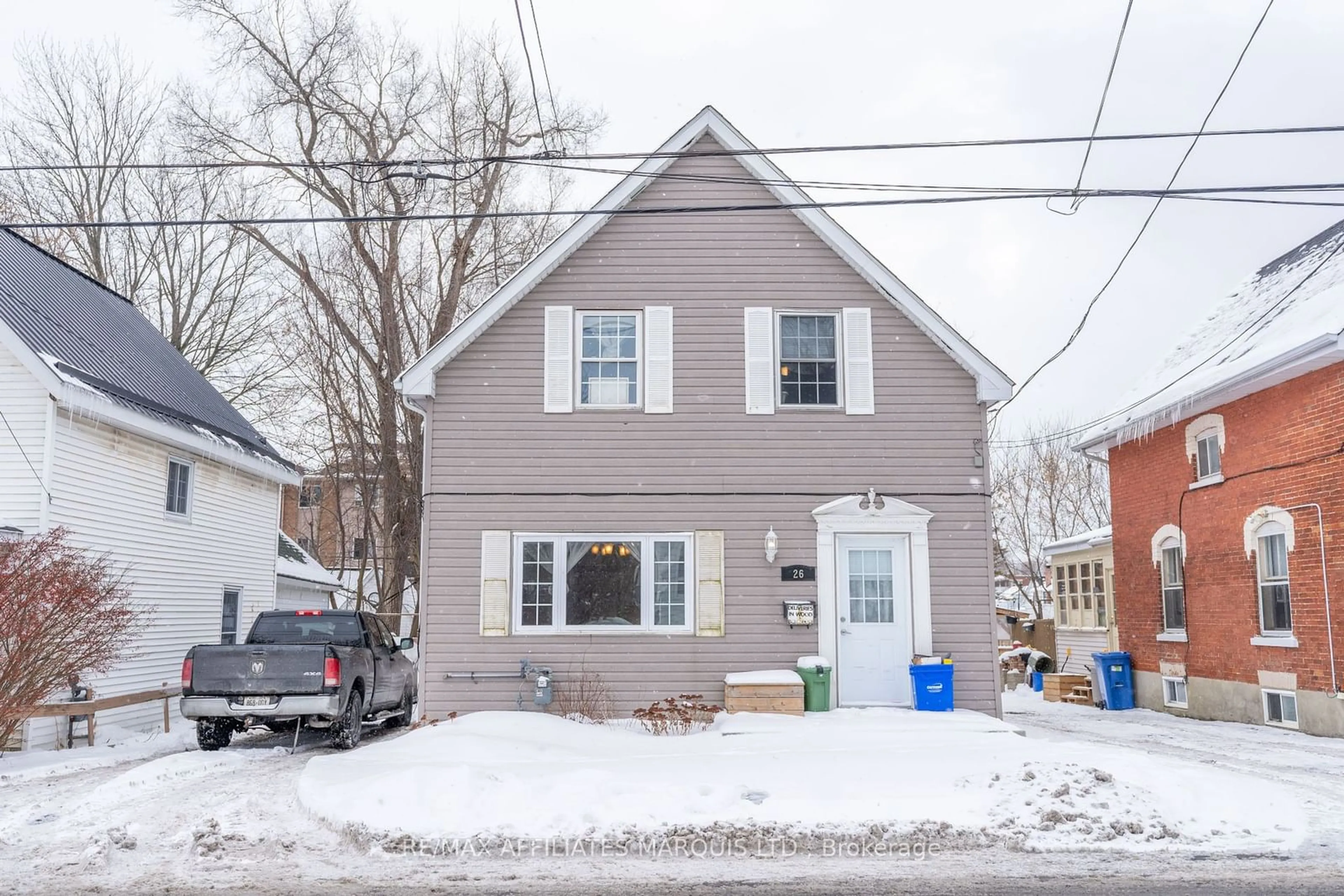 Home with vinyl exterior material, street for 26 Sixth St, Cornwall Ontario K6J 2W3