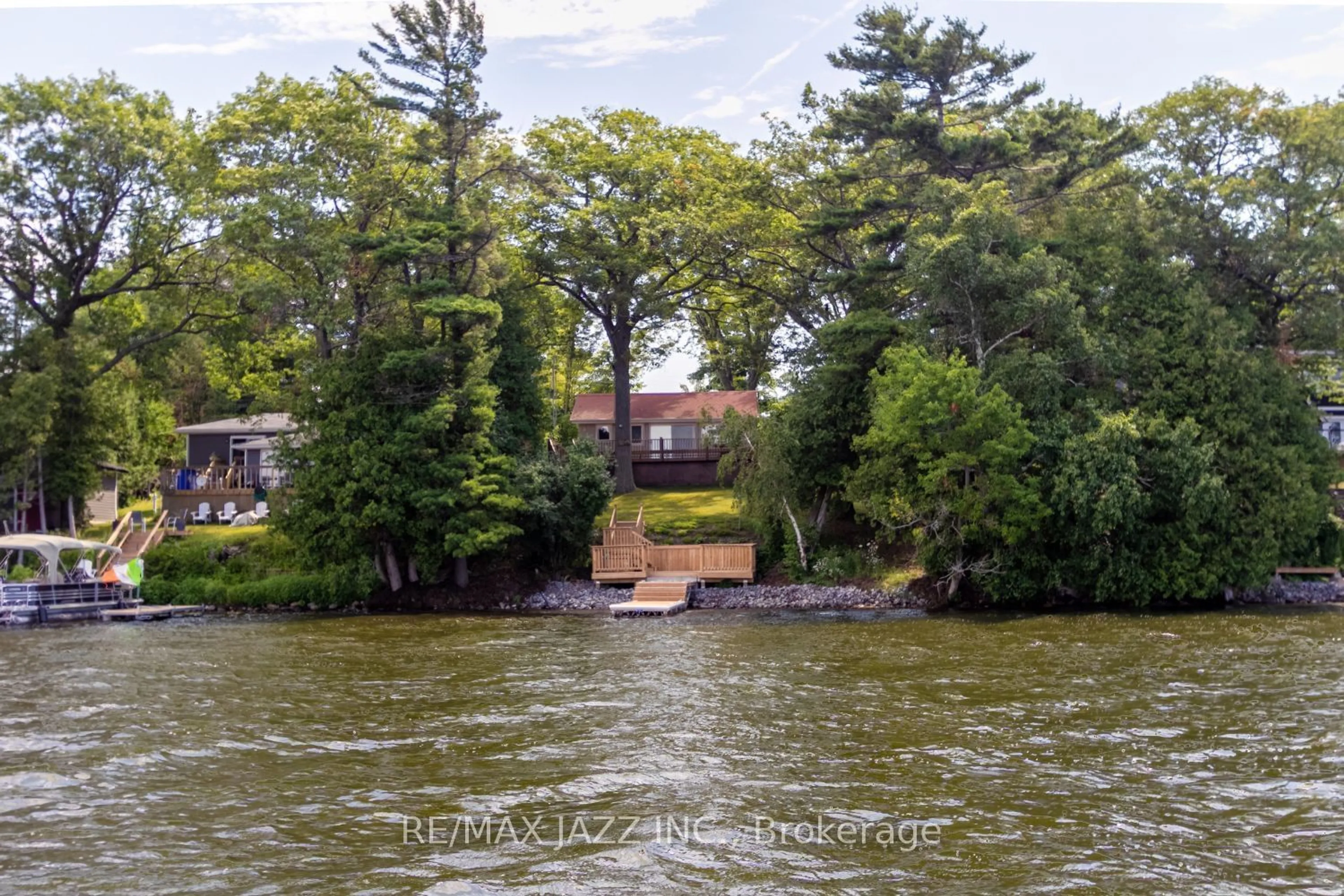 A pic from outside/outdoor area/front of a property/back of a property/a pic from drone, water/lake/river/ocean view for 52 Cow Island, Otonabee-South Monaghan Ontario K0L 1B0