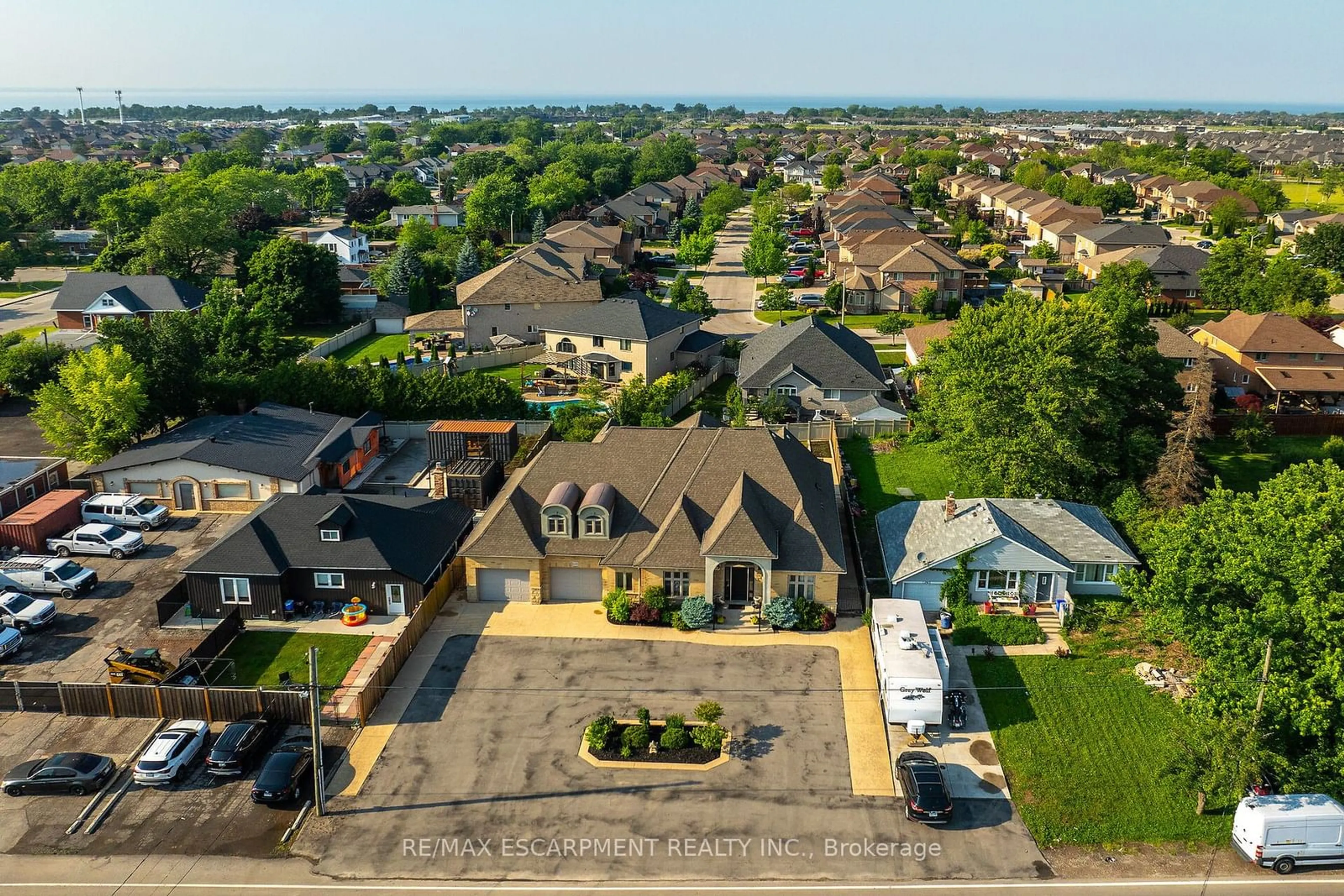 A pic from outside/outdoor area/front of a property/back of a property/a pic from drone, street for 1291 Hwy 8, Hamilton Ontario L8E 5K5