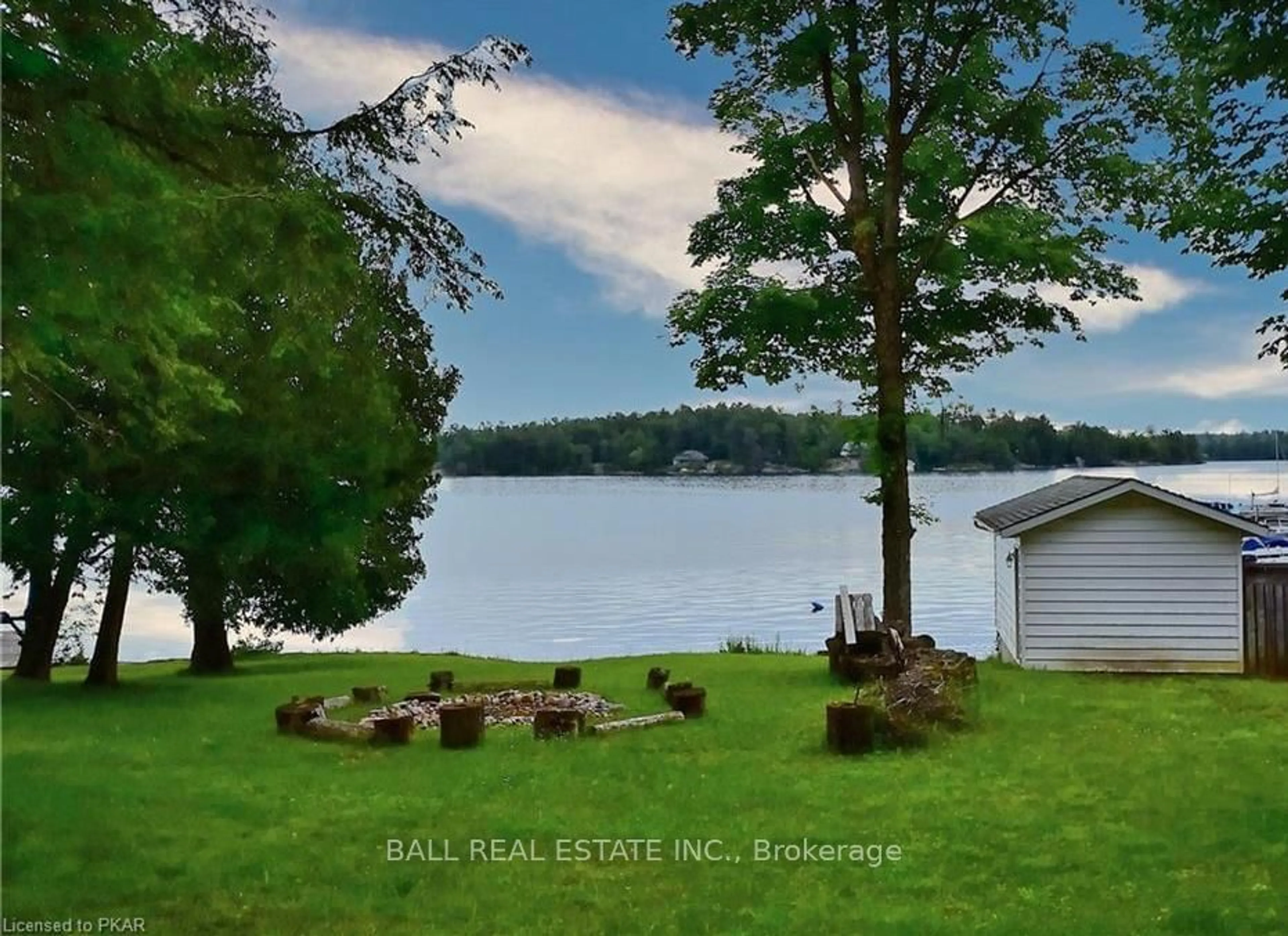 A pic from outside/outdoor area/front of a property/back of a property/a pic from drone, water/lake/river/ocean view for 2553 Hiawatha Lane, Smith-Ennismore-Lakefield Ontario K0L 2H0