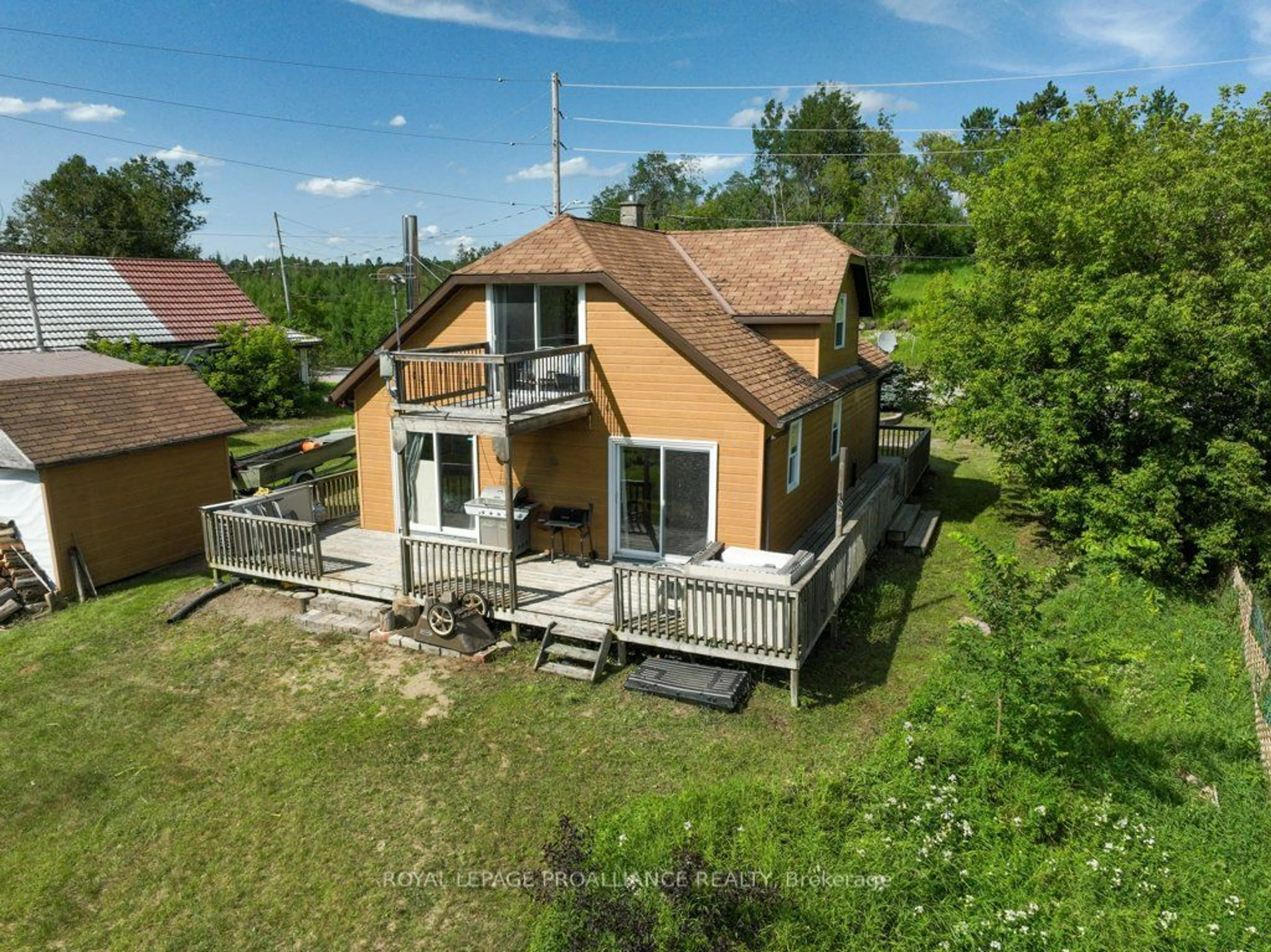 A pic from outside/outdoor area/front of a property/back of a property/a pic from drone, building for 7517 Road 509, North Frontenac Ontario K0H 2M0