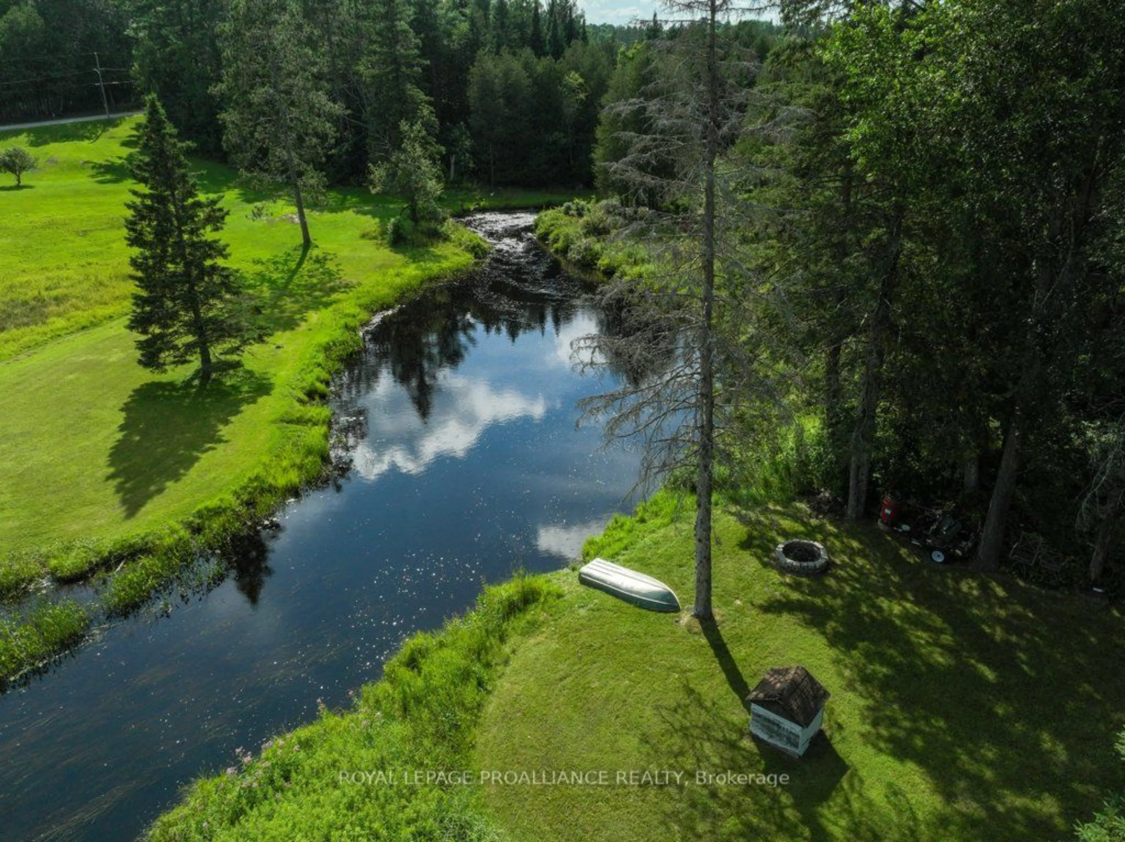 A pic from outside/outdoor area/front of a property/back of a property/a pic from drone, water/lake/river/ocean view for 7517 Road 509, North Frontenac Ontario K0H 2M0