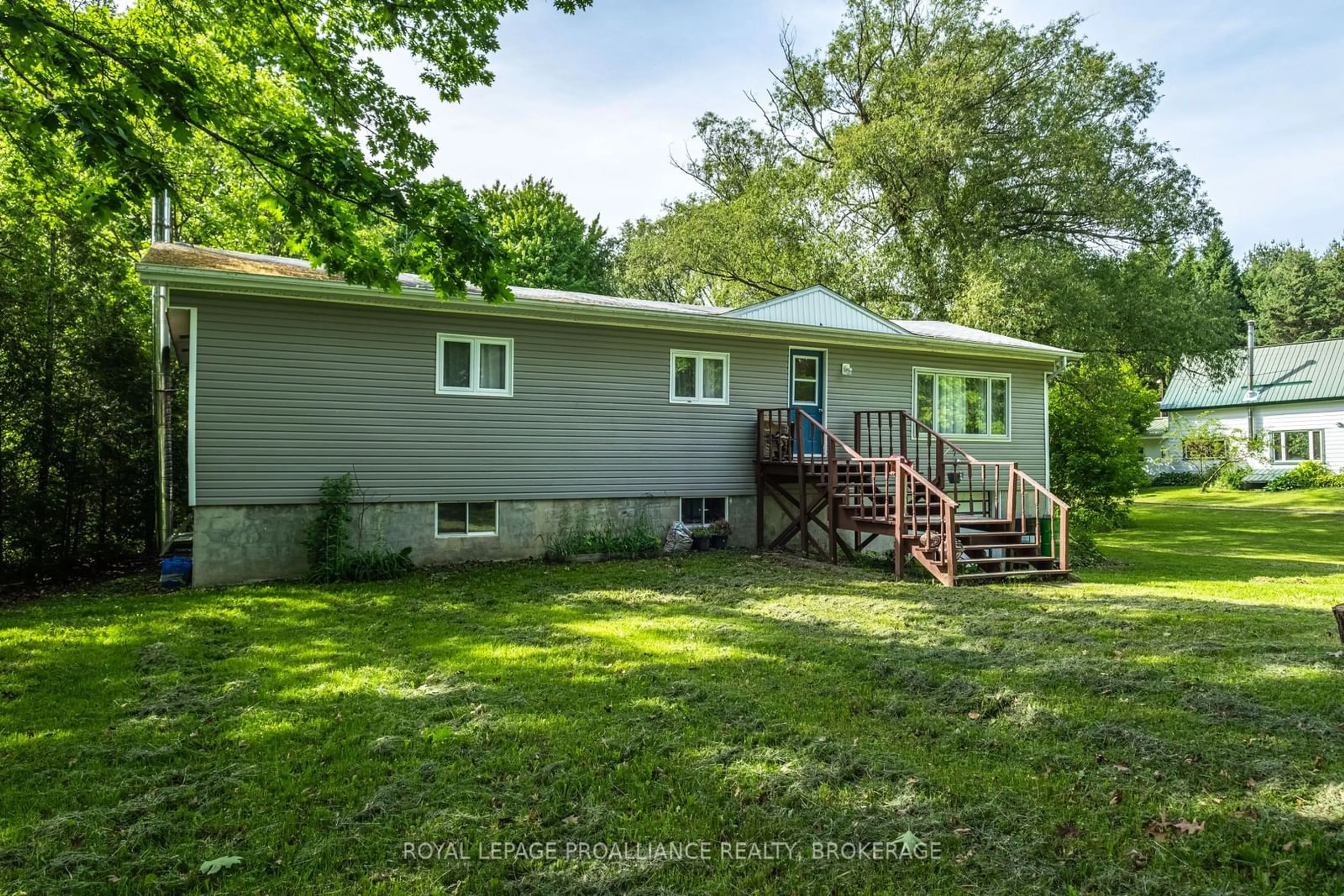 A pic from outside/outdoor area/front of a property/back of a property/a pic from drone, unknown for 32 Old River Rd, Leeds and the Thousand Islands Ontario K0E 1R0