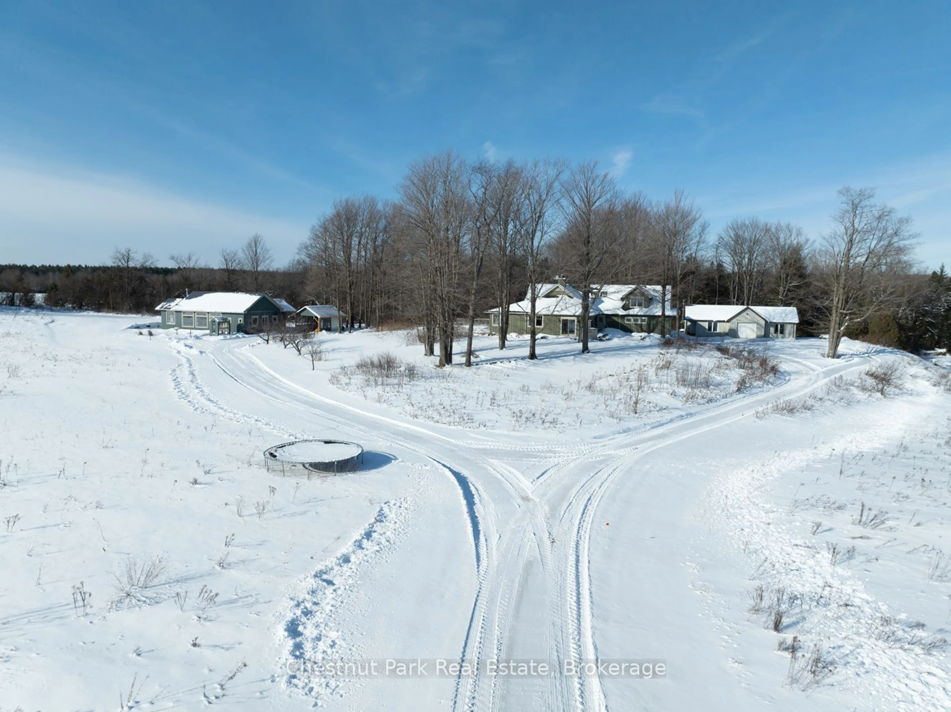 A pic from outside/outdoor area/front of a property/back of a property/a pic from drone, street for 468147 12th Concession B, Grey Highlands Ontario N0C 1C0