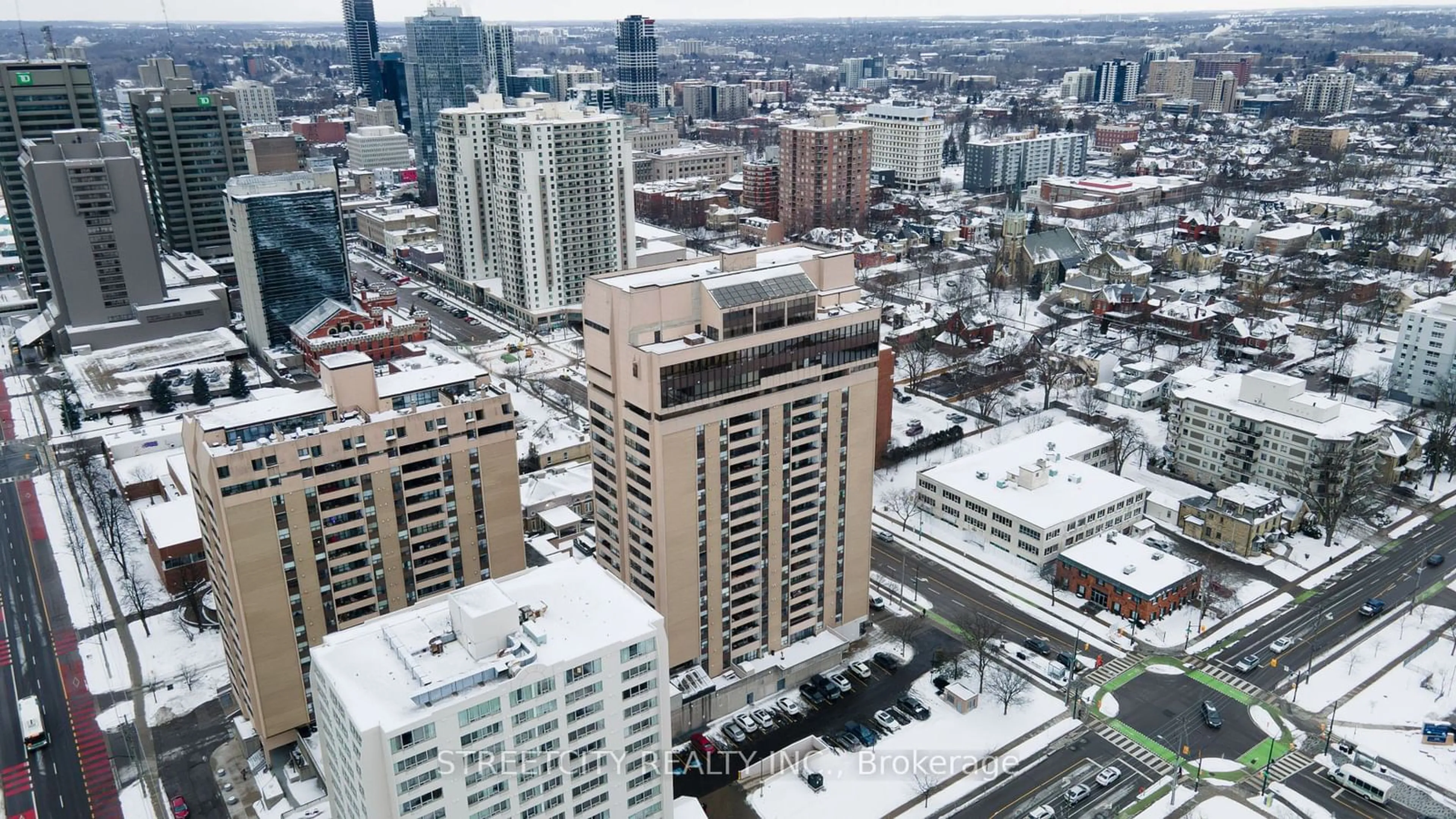 A pic from outside/outdoor area/front of a property/back of a property/a pic from drone, city buildings view from balcony for 389 Dundas St #804, London Ontario N6B 3L5