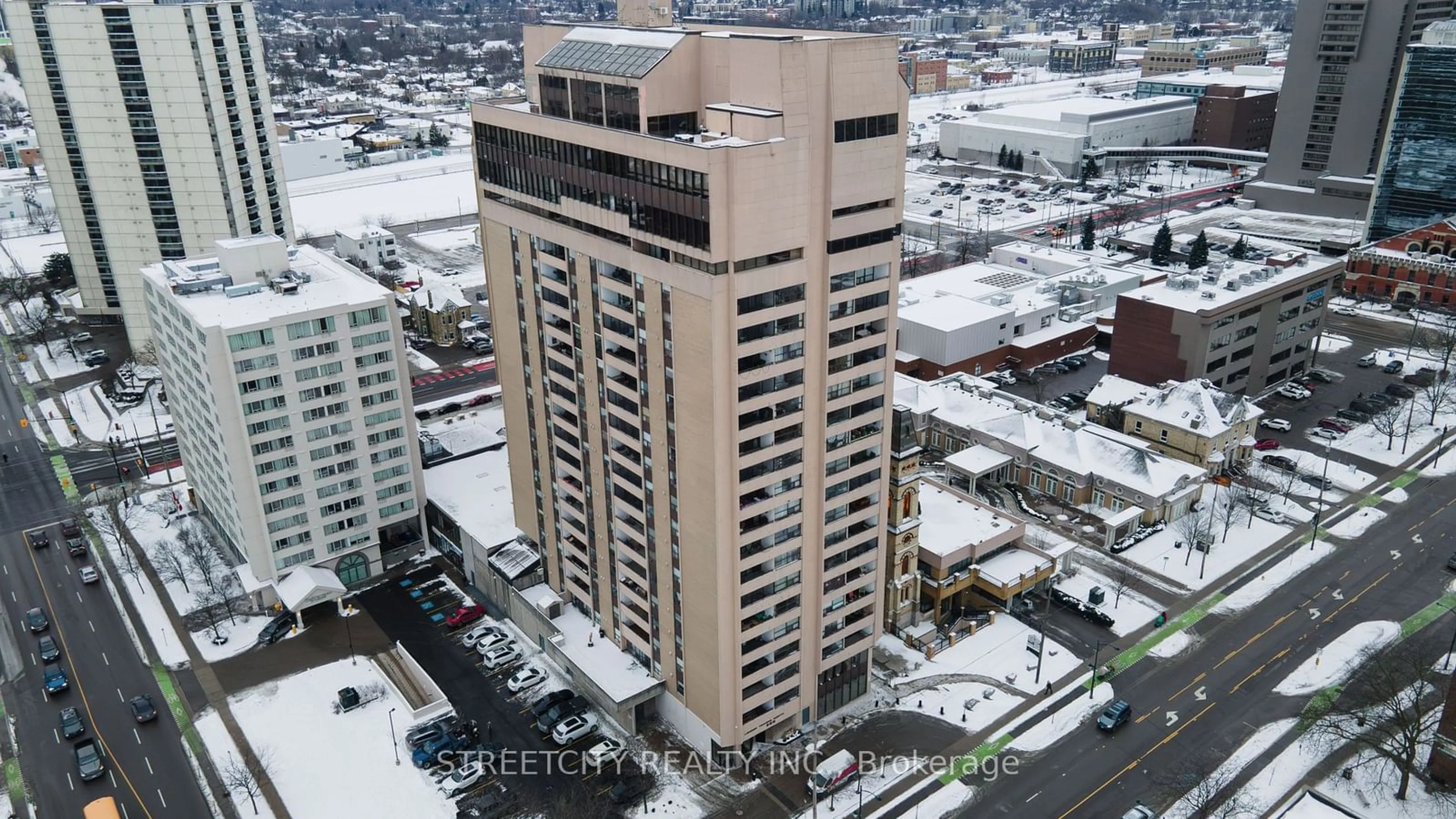 A pic from outside/outdoor area/front of a property/back of a property/a pic from drone, city buildings view from balcony for 389 Dundas St #804, London Ontario N6B 3L5