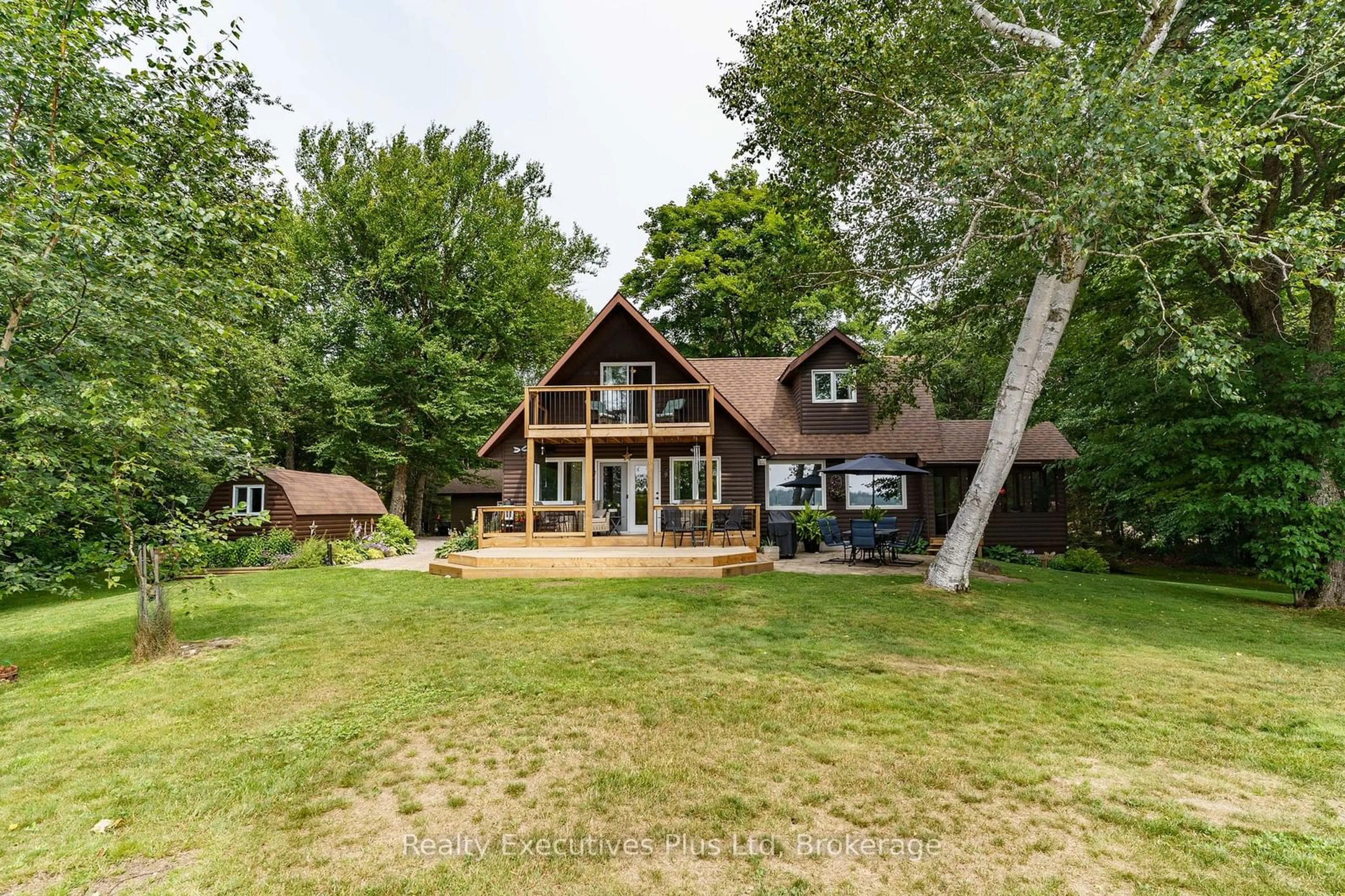 A pic from outside/outdoor area/front of a property/back of a property/a pic from drone, water/lake/river/ocean view for 739 Deer Lake Rd, Parry Sound Ontario P0A 1X0